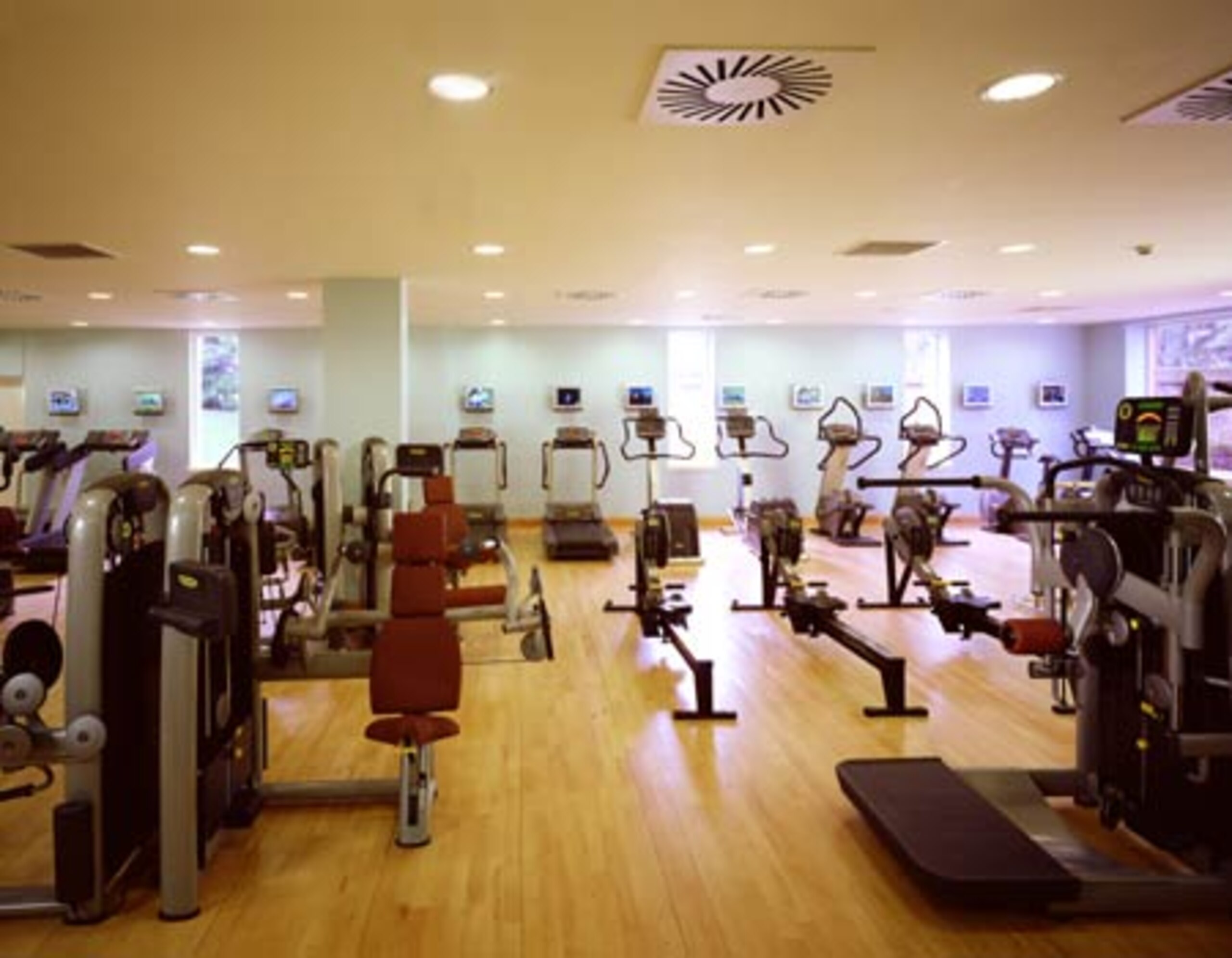 You might think this gym is empty, when, in fact, 46 people are lined up against the wall because Marty called dibs on every single one of these pieces of equipment.