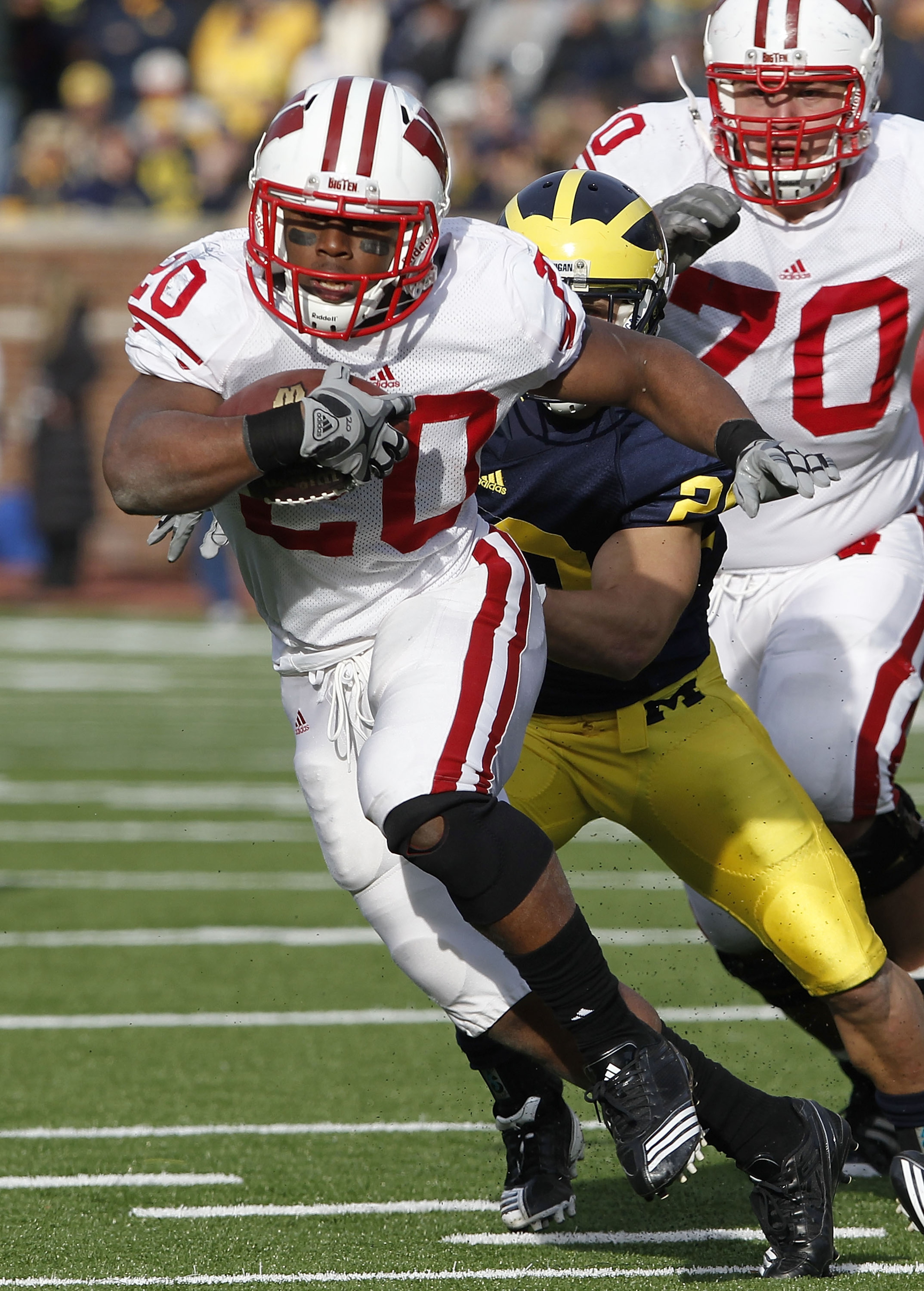 ANN ARBOR, MI - NOVEMBER 20: James White #20 of the Wisconsin Badgers looks for running room while playing the Michigan Wolverines at Michigan Stadium on November 20, 2010 in Ann Arbor, Michigan. Wisconson won the game 48-28. (Photo by Gregory Shamus/Ge ANN ARBOR, MI - NOVEMBER 20: James White #20 of the Wisconsin Badgers looks for running room while playing the Michigan Wolverines at Michigan Stadium on November 20, 2010 in Ann Arbor, Michigan. Wisconson won the game 48-28. (Photo by Gregory Shamus/Ge