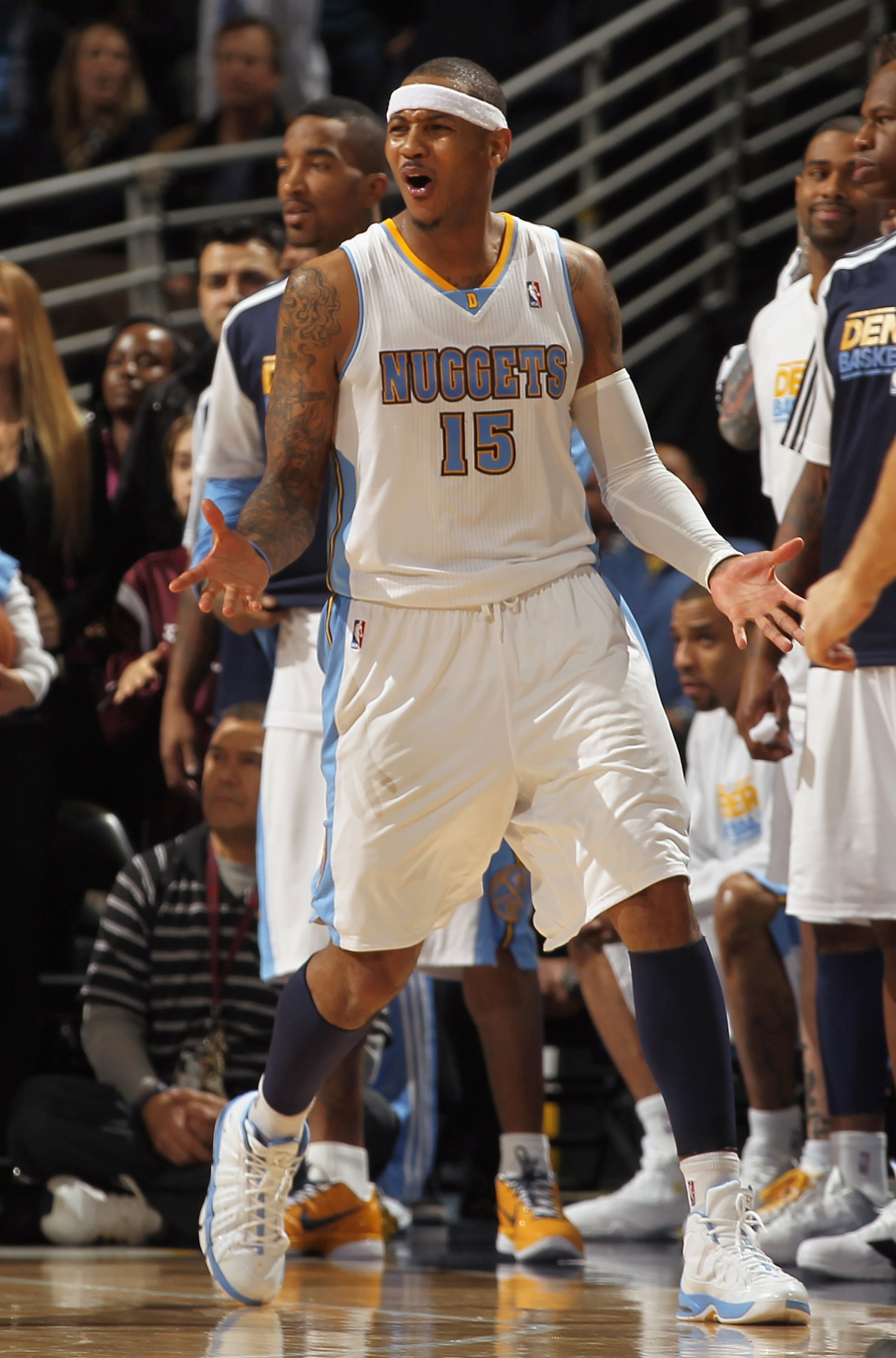 DENVER, CO - FEBRUARY 10:  Carmelo Anthony #15 of the Denver Nuggets reacts after fouling out of the game late in the fourth quarter after a foul on Dirk Nowitzki of the Dallas Mavericks during NBA action at the Pepsi Center on February 10, 2011 in Denver