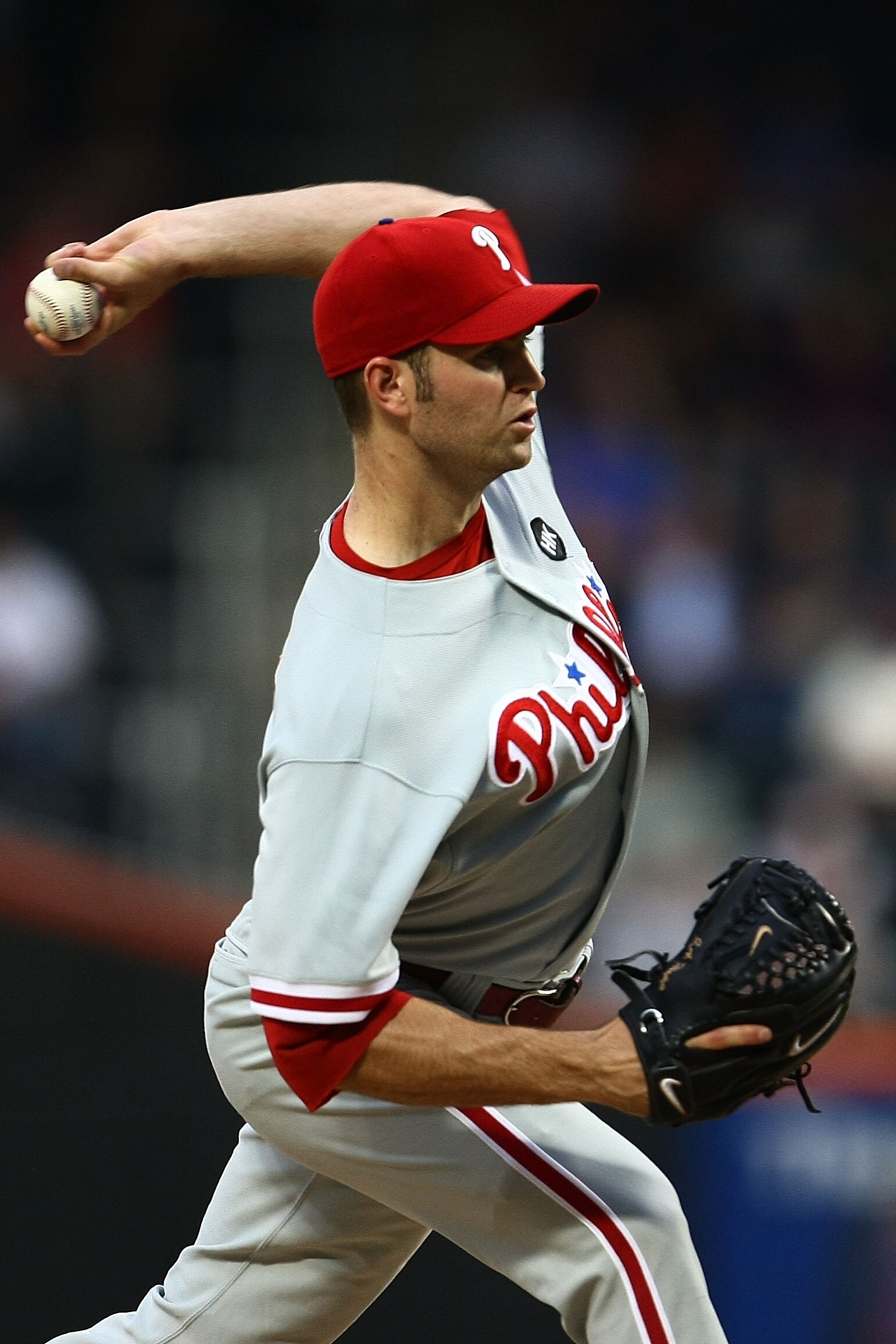NEW YORK - JUNE 09:  J.A. Happ #43 of the Philadelphia Phillies pitches against the  New York Mets  during their game at Citi Field on June 9, 2009 in the Flushing neighborhood of the Queens borough of New York City.  (Photo by Chris McGrath/Getty Images)