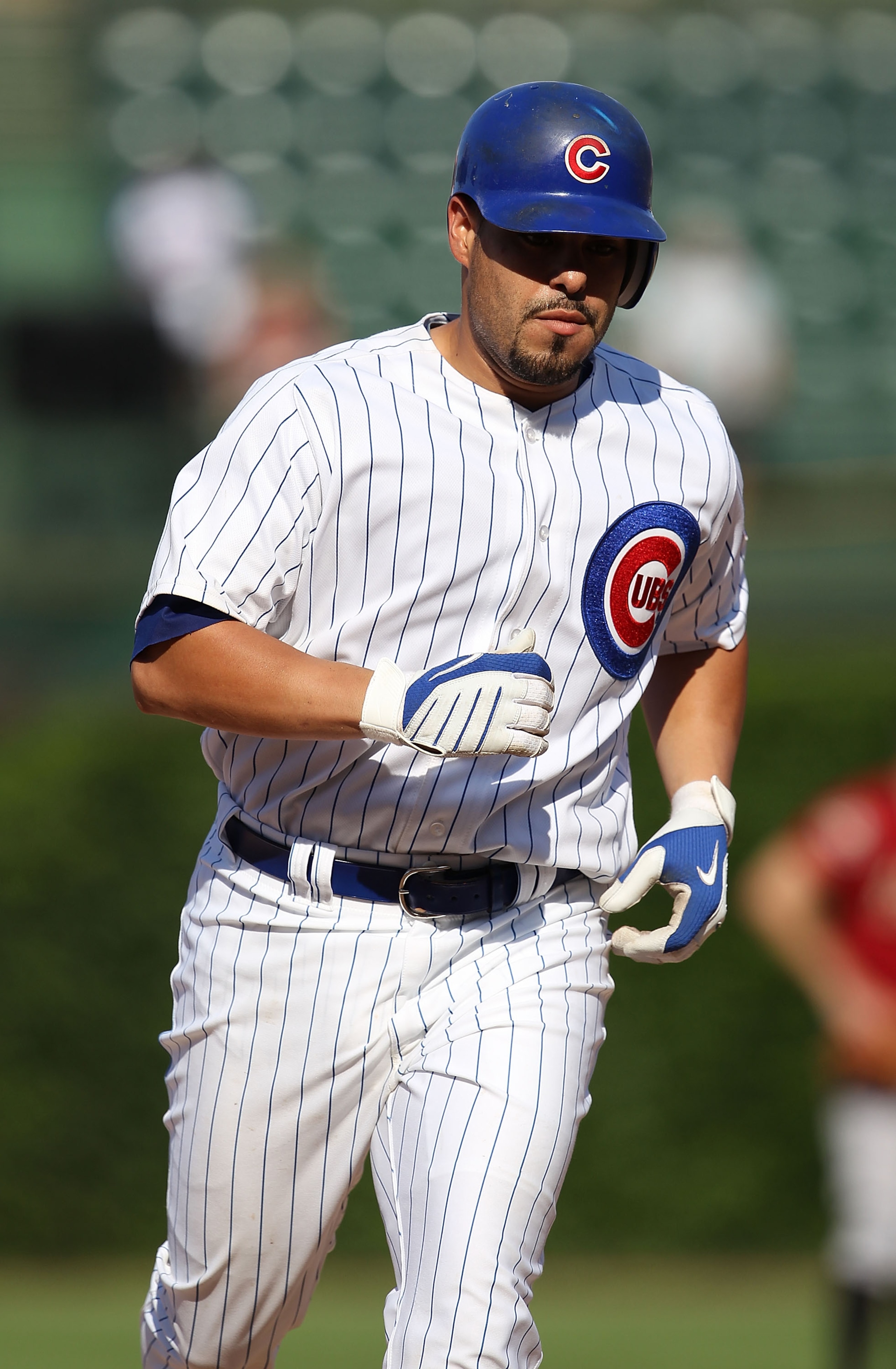 CHICAGO - JULY 21: Geovany Soto #18 of the Chicago Cubs runs the bases after hitting a two-run home run in the 11th inning against the Houston Astros at Wrigley Field on July 21, 2010 in Chicago, Illinois. The Astros defeated the Cubs 4-3 in 12 innings. (