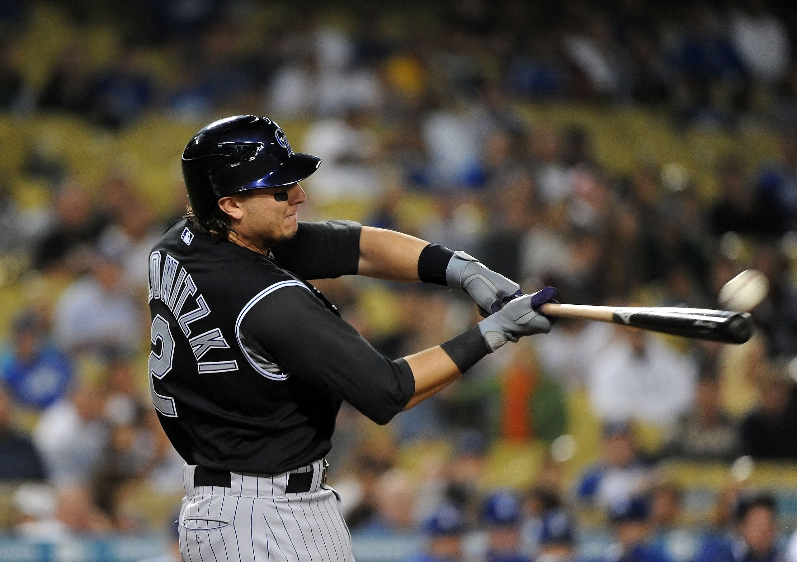 LOS ANGELES, CA - SEPTEMBER 17:  Troy Tulowitzki #2 of the Colorado Rockies hits a two-run home run in the first inning against the Los Angeles Dodgers at Dodger Stadium on September 17, 2010 in Los Angeles, California.  (Photo by Lisa Blumenfeld/Getty Im