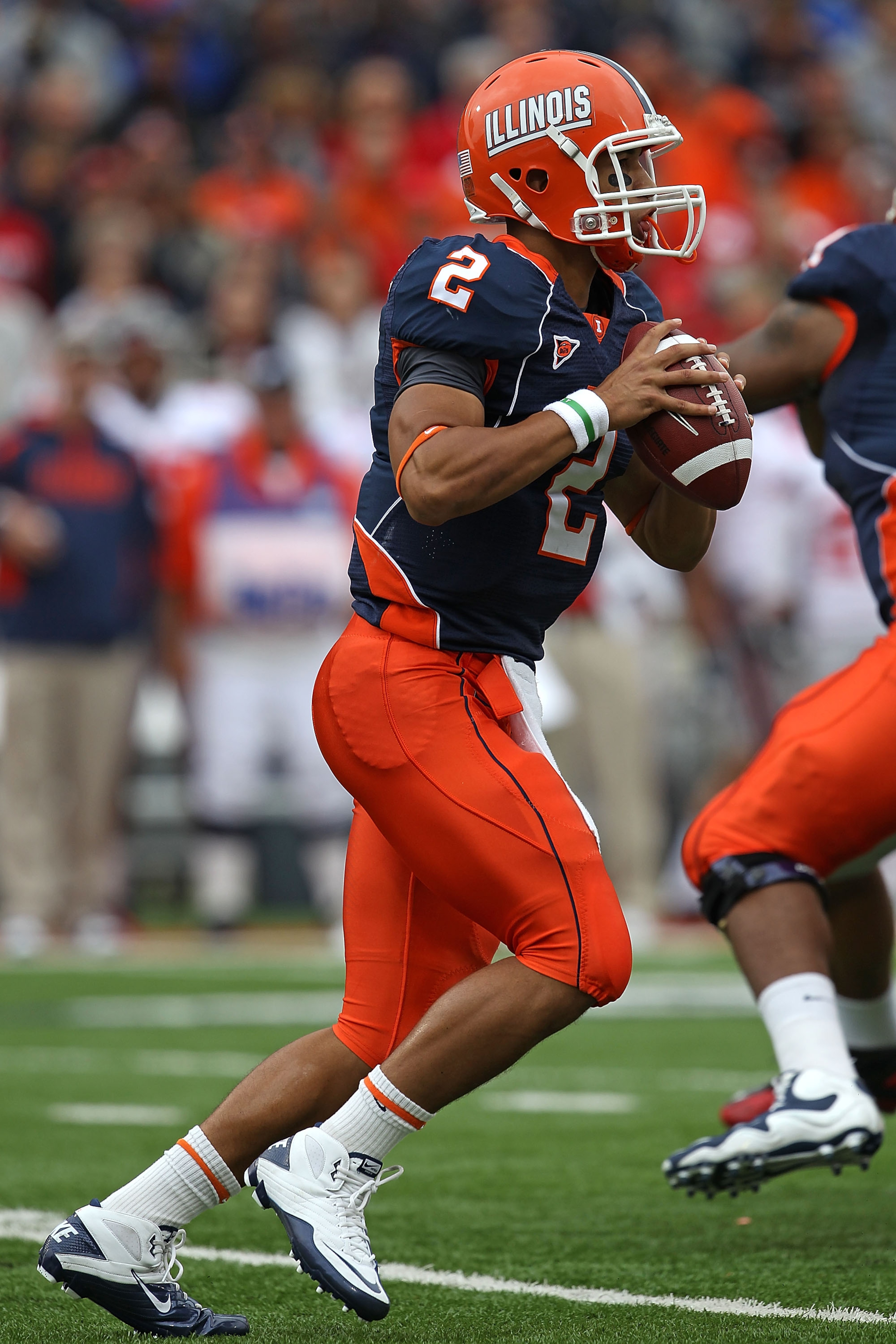 CHAMPAIGN, IL - OCTOBER 02: Nathan Scheelhaase #2 of the Illinois Fighting Illini looks for a receiver against the Ohio State Buckeyes at Memorial Stadium on October 2, 2010 in Champaign, Illinois. Ohio State defeated Illinois 24-13. (Photo by Jonathan Da CHAMPAIGN, IL - OCTOBER 02: Nathan Scheelhaase #2 of the Illinois Fighting Illini looks for a receiver against the Ohio State Buckeyes at Memorial Stadium on October 2, 2010 in Champaign, Illinois. Ohio State defeated Illinois 24-13. (Photo by Jonathan Da
