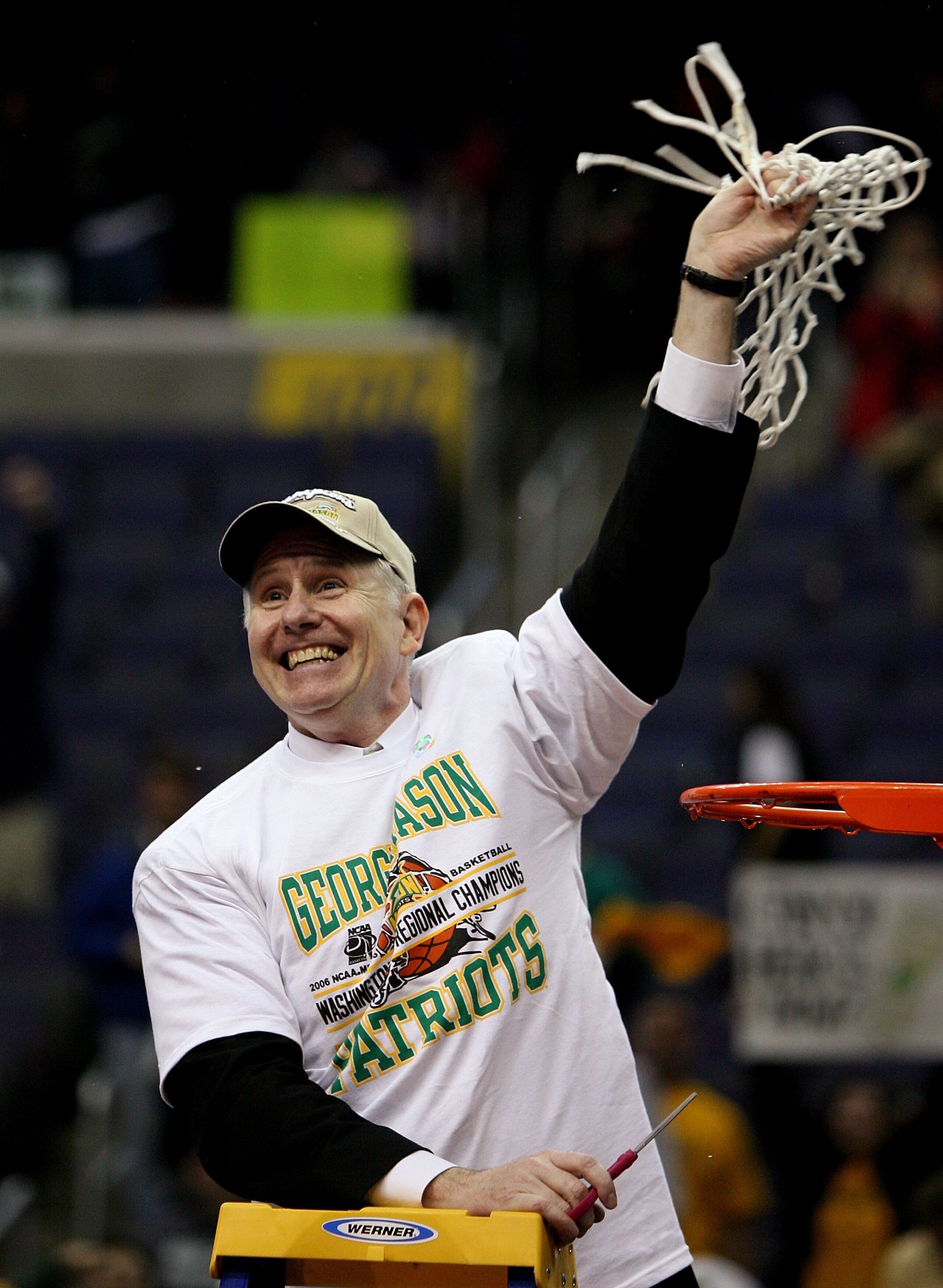 WASHINGTON - MARCH 26: Head coach Jim Larranaga of the George Mason Patriots celebrate their win over the Connecticut Huskies during the Regional Finals of the NCAA Men's Basketball Tournament on March 26, 2006 at the Verizon Center in Washington DC. The WASHINGTON - MARCH 26: Head coach Jim Larranaga of the George Mason Patriots celebrate their win over the Connecticut Huskies during the Regional Finals of the NCAA Men's Basketball Tournament on March 26, 2006 at the Verizon Center in Washington DC. The