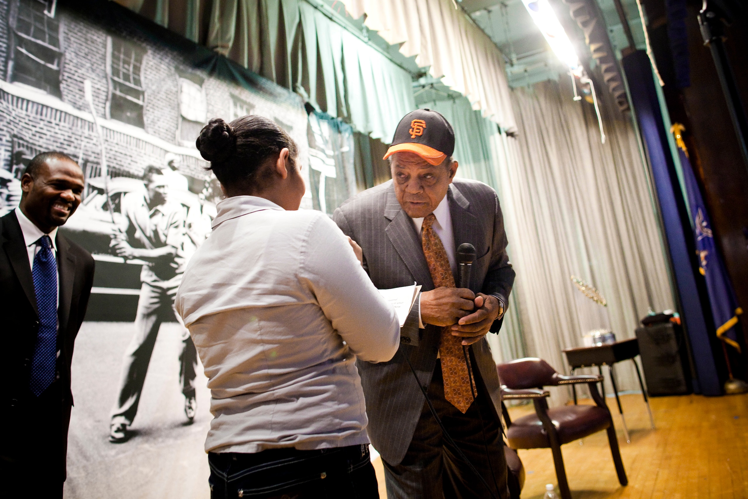NEW YORK - JANURARY 21: Willie Mays, right, answers questions from students during a visit to PS 46 in Harlem, next to the site of the former Polo Grounds, where the new York Giants played before moving to San Francisco in 1958, on Jan. 21, 2011 in New Y NEW YORK - JANURARY 21: Willie Mays, right, answers questions from students during a visit to PS 46 in Harlem, next to the site of the former Polo Grounds, where the new York Giants played before moving to San Francisco in 1958, on Jan. 21, 2011 in New Y