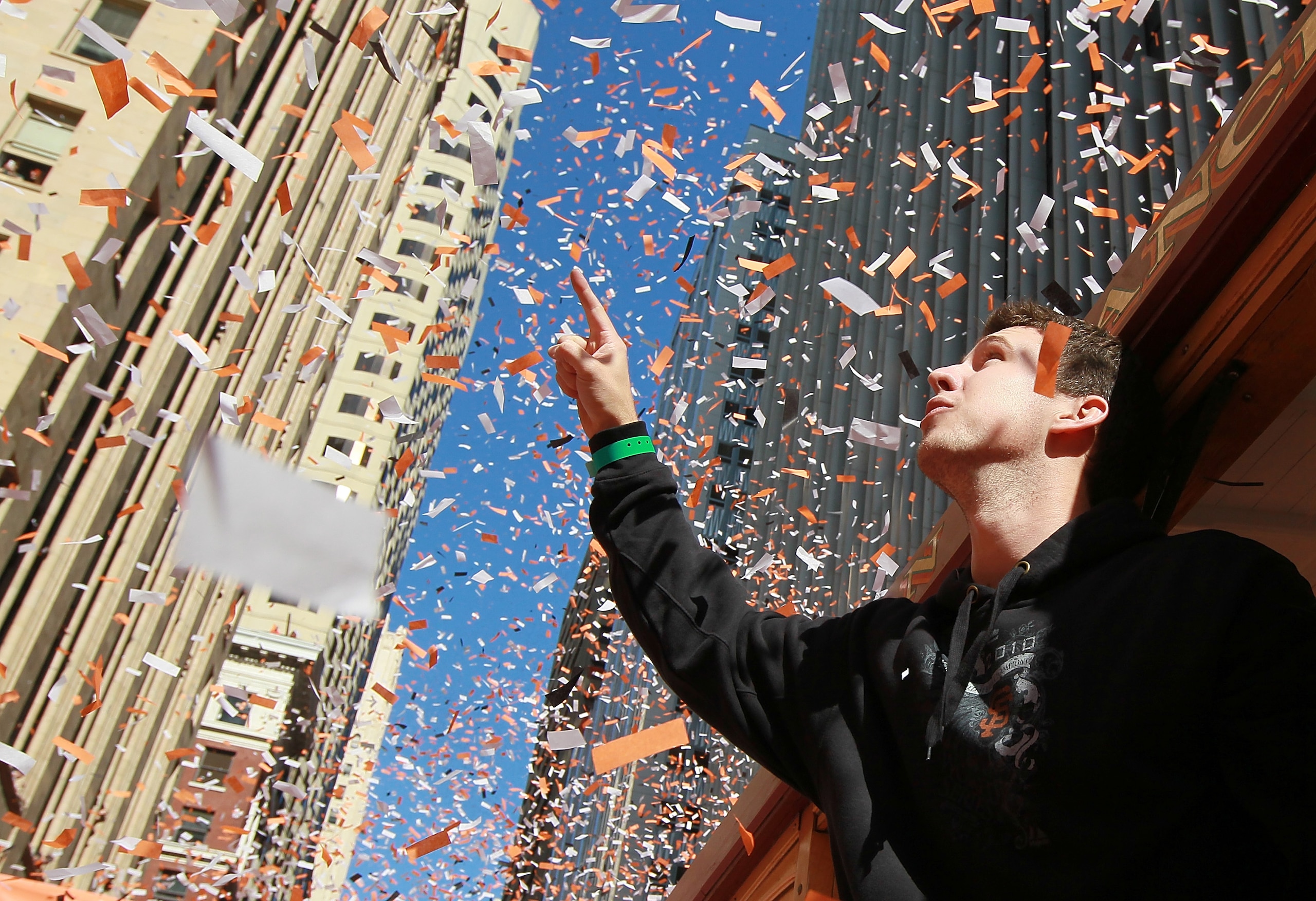 SAN FRANCISCO - NOVEMBER 03: Buster Posey of the San Francisco Giants celebrates during the Giants' vicotry parade on November 3, 2010 in San Francisco, California. Thousands of Giants fans lined the streets of San Francisco to watch the San Francisco Gi SAN FRANCISCO - NOVEMBER 03: Buster Posey of the San Francisco Giants celebrates during the Giants' vicotry parade on November 3, 2010 in San Francisco, California. Thousands of Giants fans lined the streets of San Francisco to watch the San Francisco Gi