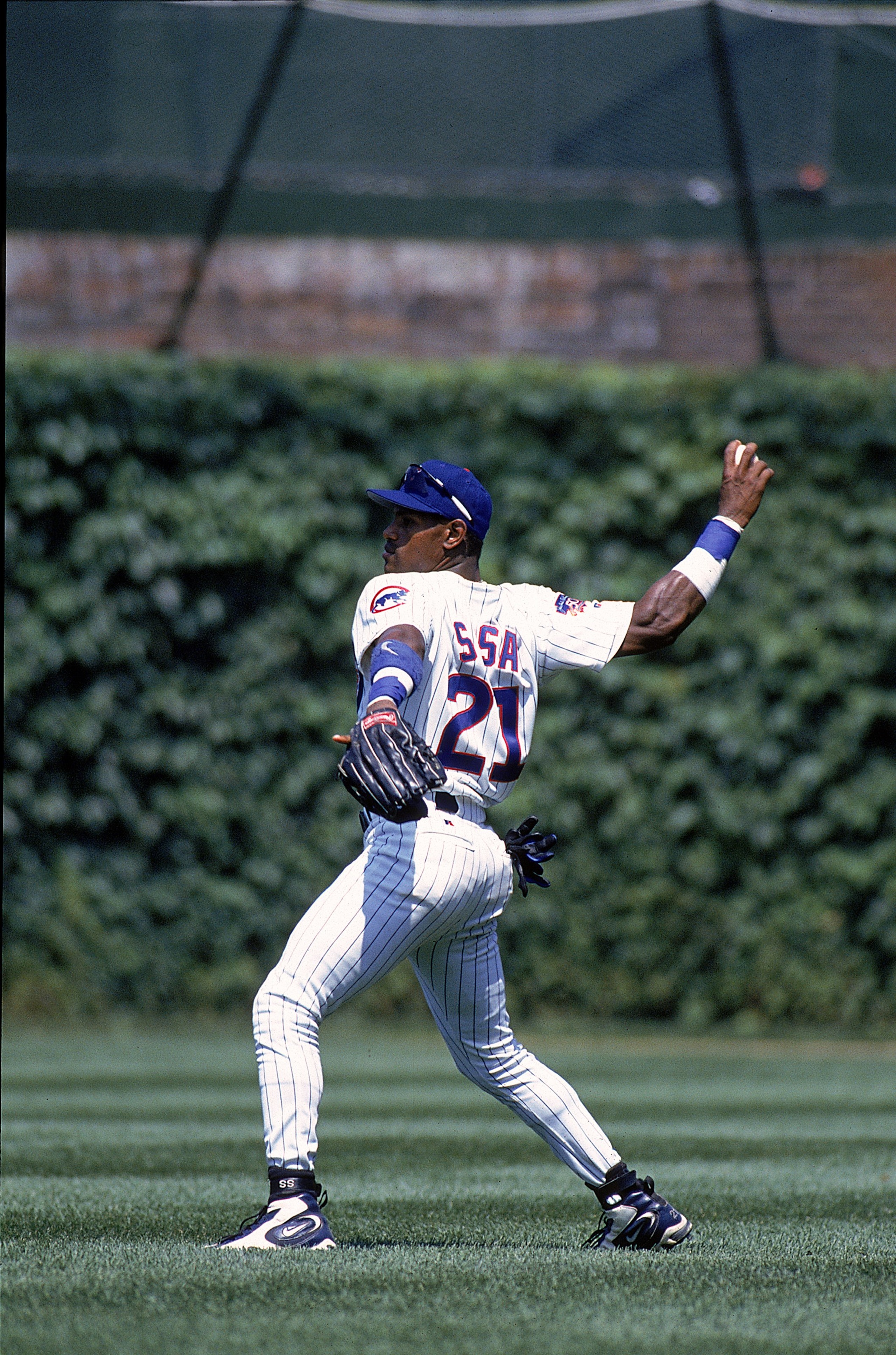1 Jul 1997:  Sammy Sosa #21 of the Chicago Cubs gets ready to throw the ball from the outfield during the game aginst the Kansas City Royals at Wrigley Field in Chicago, Illinois. The Cubs defeated the Royals 6-1.  Mandatory Credit: Jonathan Daniel  /Alls