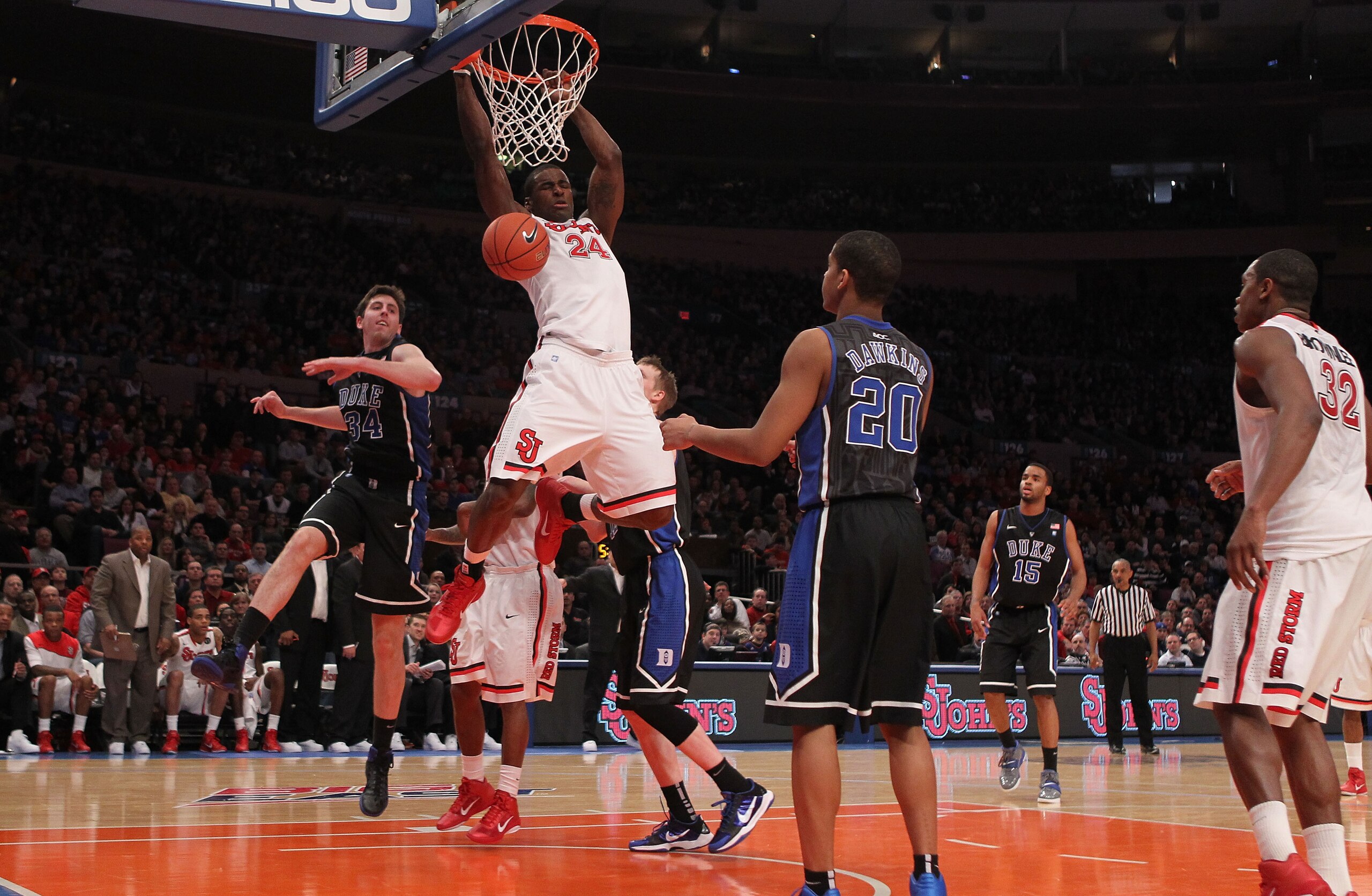 NEW YORK, NY - JANUARY 30: Justin Burrell #24 of the St. John's Red Storm dunks the ball against the Duke Blue Devils at Madison Square Garden on January 30, 2011 in New York City. (Photo by Nick Laham/Getty Images) NEW YORK, NY - JANUARY 30: Justin Burrell #24 of the St. John's Red Storm dunks the ball against the Duke Blue Devils at Madison Square Garden on January 30, 2011 in New York City. (Photo by Nick Laham/Getty Images)