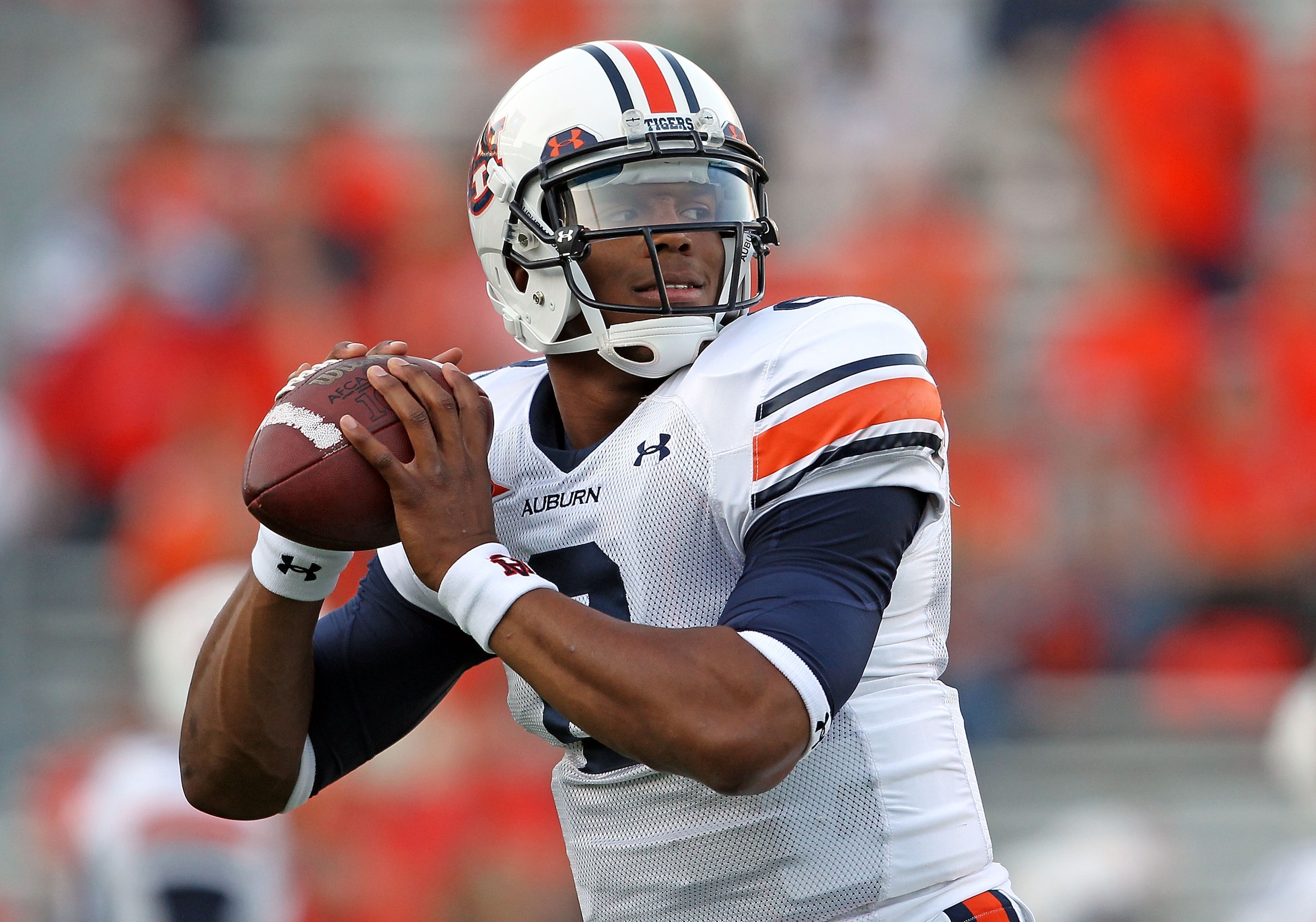 LEXINGTON, KY - OCTOBER 09:  Cam Newton #2 of the Auburn Tigers throws a pass as he warms up before the SEC game against the Kentucky Wildcats at Commonwealth Stadium on October 9, 2010 in Lexington, Kentucky.  (Photo by Andy Lyons/Getty Images)