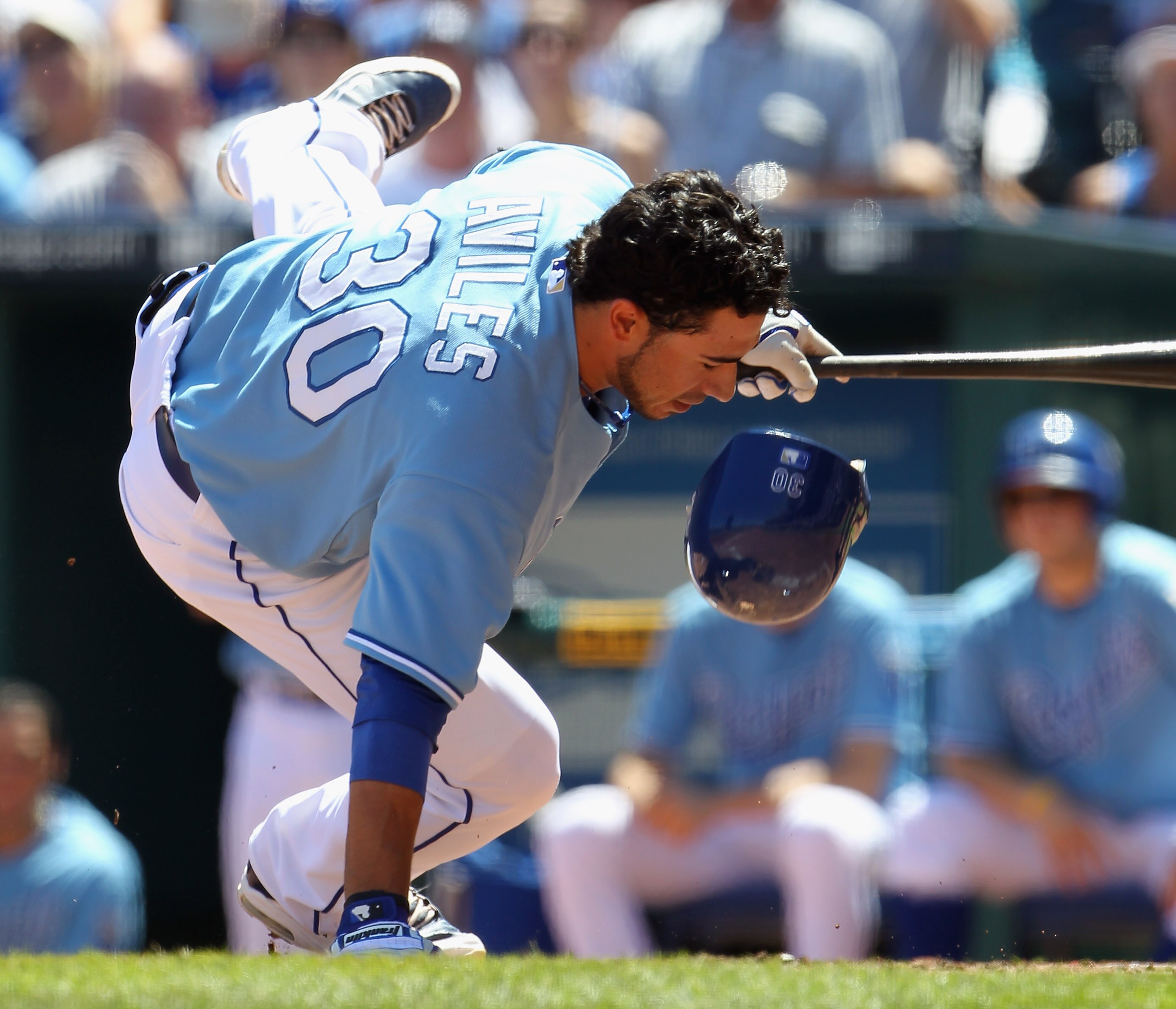 KANSAS CITY, MO - AUGUST 15:  Mike Aviles #30 of the Kansas City Royals is hit by a pitch during the game against the New York Yankees on August 15, 2010 at Kauffman stadium in Kansas City, Missouri.  (Photo by Jamie Squire/Getty Images)