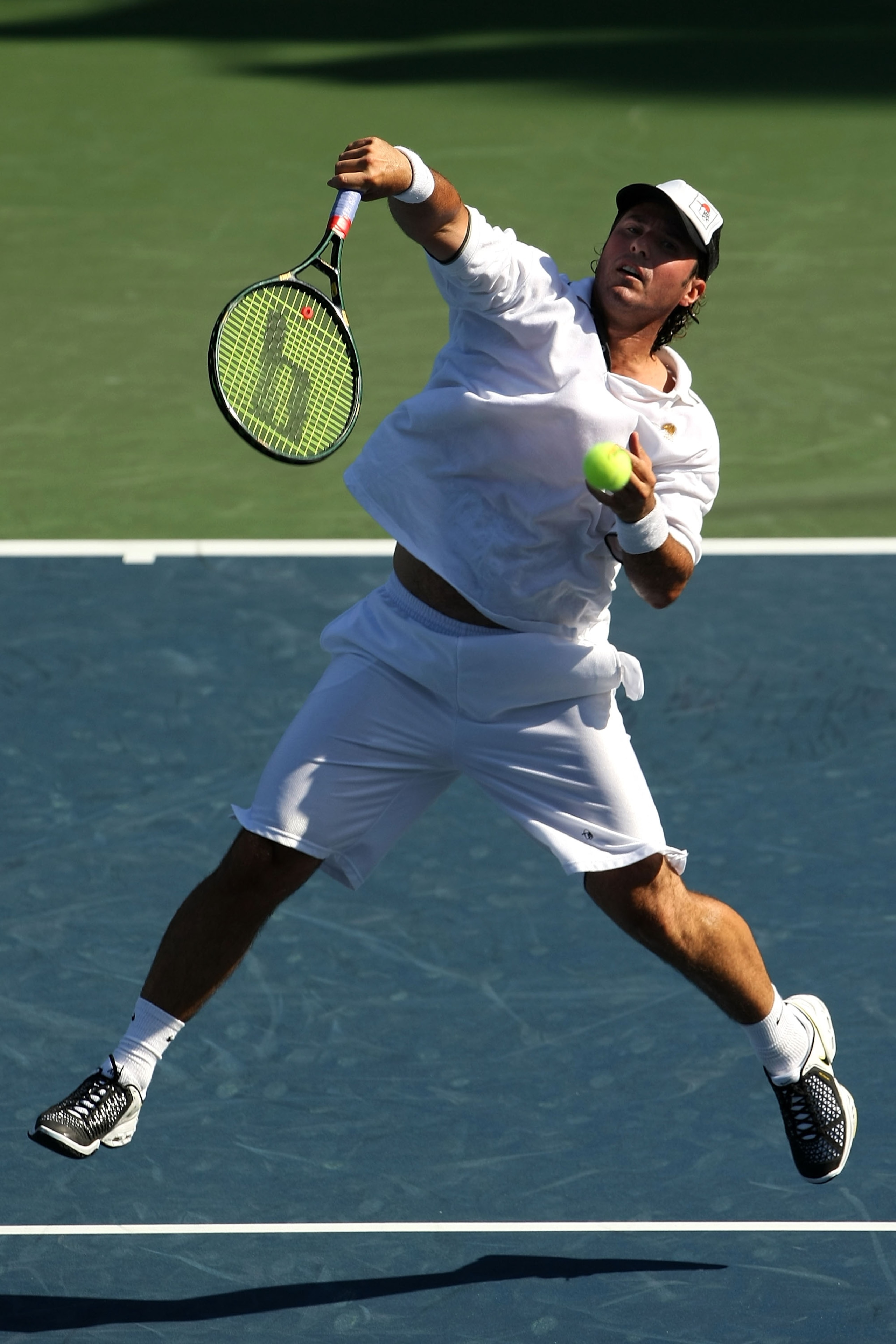 LOS ANGELES, CA - JULY 27:  Vincent Spadea returns a shot against Robert Kendrick during the LA Tennis Open Day 1 at Los Angeles Tennis Center - UCLA on July 27, 2009 in Los Angeles, California.  Kendrick defeated Spadea 6-0, 6-0.  (Photo by Stephen Dunn/