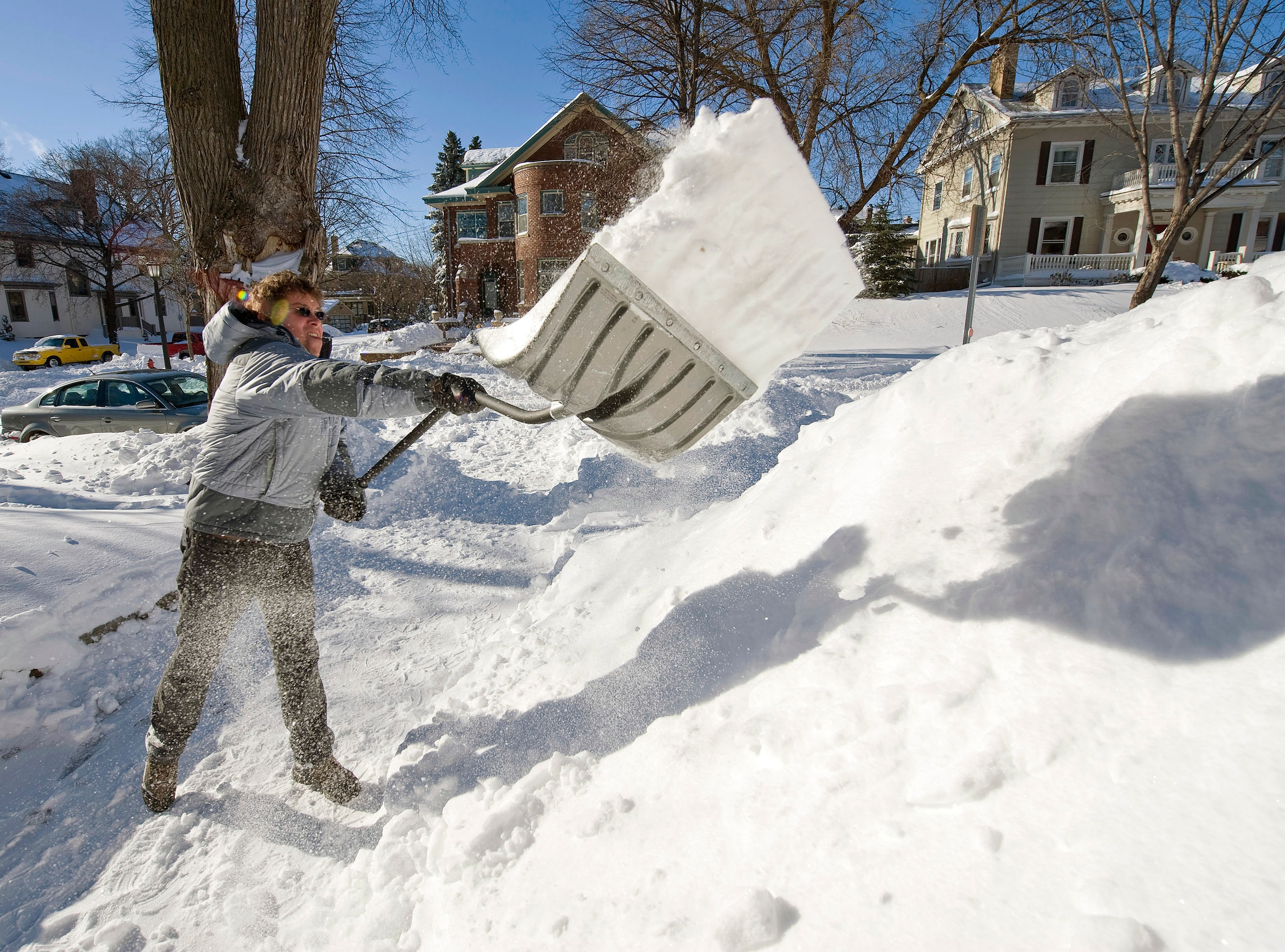 MINNEAPOLIS, MN - DECEMBER 12: Larry Myer of Minneapolis shovels out his driveway after a snow storm December 12, 2010 in Minneapolis, Minnesota. A blizzard dumped more than 20 inches of snow in parts of the Midwest forcing the NFL football game between MINNEAPOLIS, MN - DECEMBER 12: Larry Myer of Minneapolis shovels out his driveway after a snow storm December 12, 2010 in Minneapolis, Minnesota. A blizzard dumped more than 20 inches of snow in parts of the Midwest forcing the NFL football game between