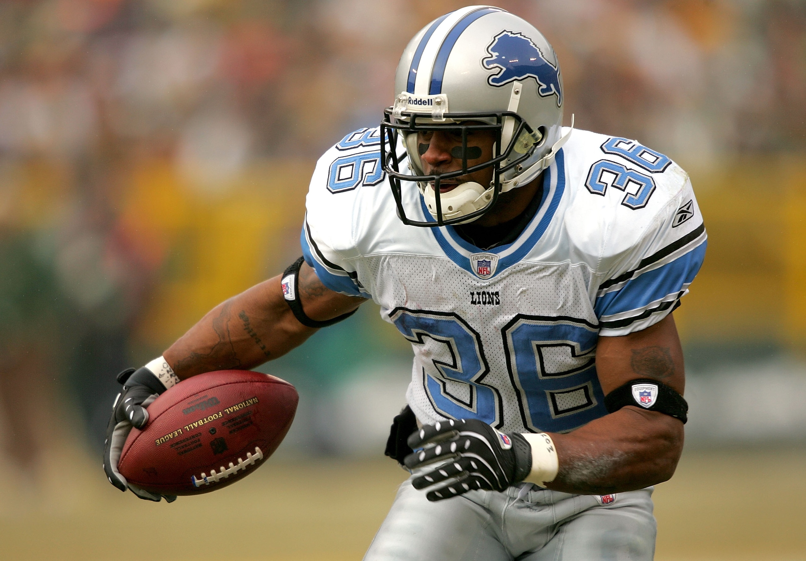 GREEN BAY, WI - DECEMBER 30:  Aveion Cason #36 of the Detroit Lions carries the ball during the game against the Green Bay Packers at Lambeau Field December 30, 2007 in Green Bay, Wisconsin. (Photo by Matthew Stockman/Getty Images)