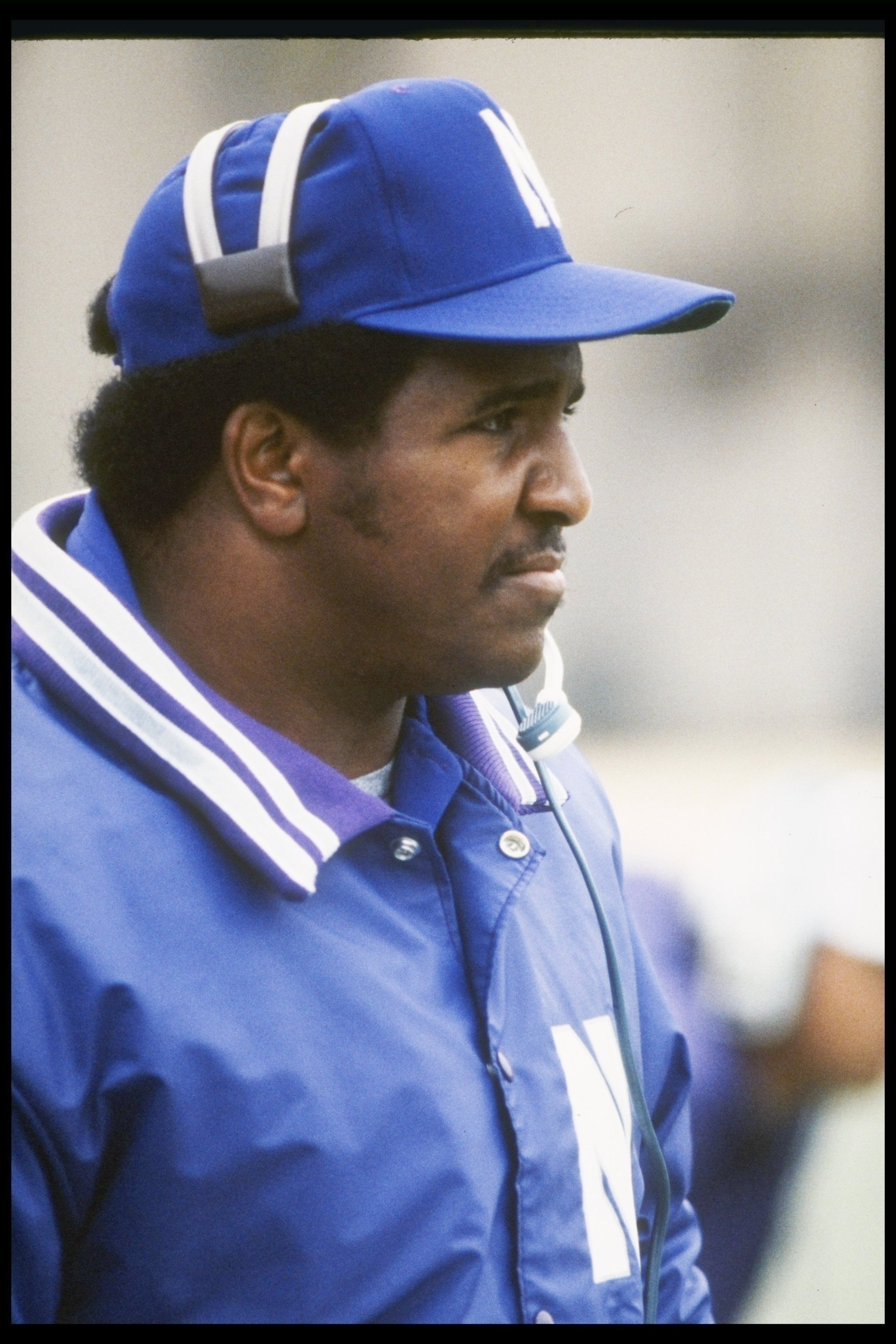 1 Oct 1982:  Northwestern Wildcats coach Dennis Green stands on the sidelines during game at Dyche Stadium in Evanston, Illinois. Mandatory Credit: Jonathan Daniel  /Allsport