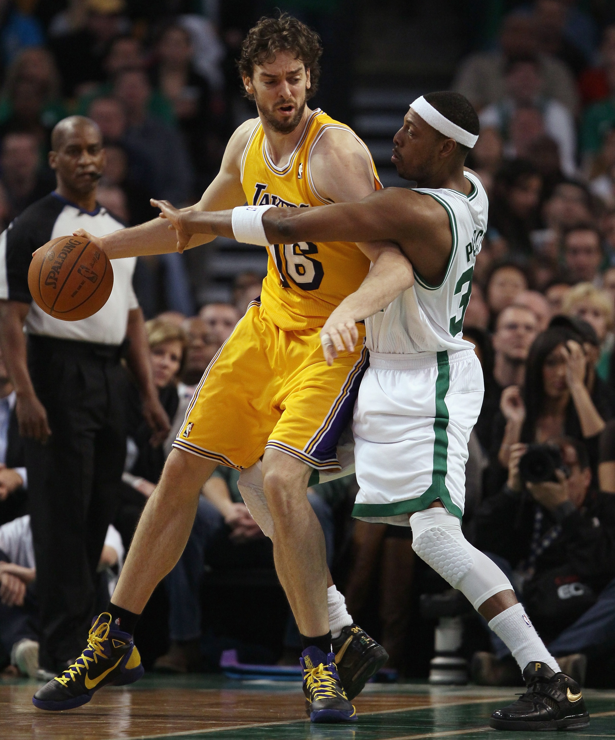 BOSTON, MA - FEBRUARY 10:  Pau Gasol #16 of the Los Angeles Lakers tries to get around Paul Pierce #34 of the Boston Celtics on February 10, 2011 at the TD Garden in Boston, Massachusetts.  NOTE TO USER: User expressly acknowledges and agrees that, by dow