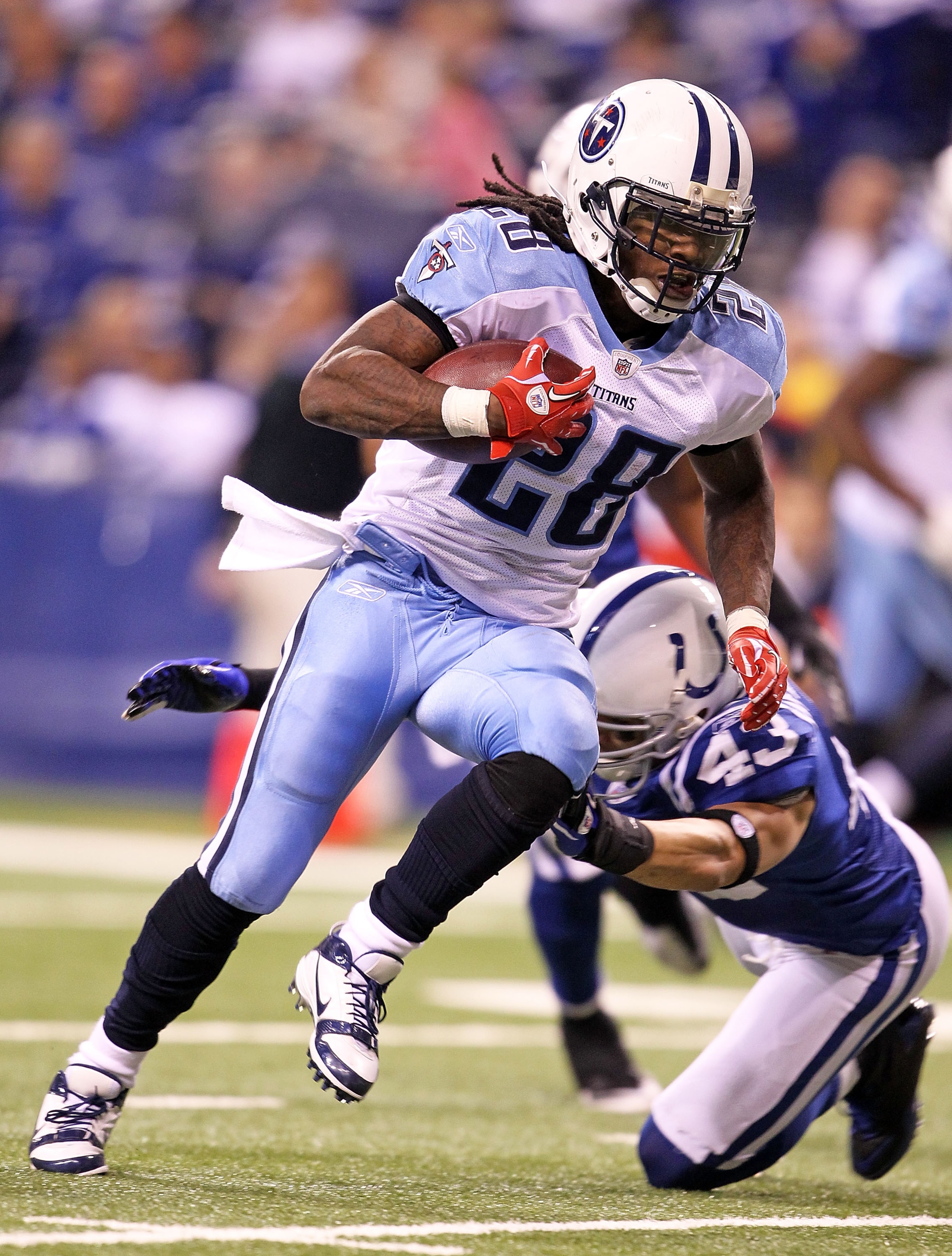 INDIANAPOLIS - JANUARY 02: Chris Johnson #28 of the Tennessee Titans runs for a touchdown during NFL game against the Indianapolis Colts at Lucas Oil Stadium on January 2, 2011 in Indianapolis, Indiana. (Photo by Andy Lyons/Getty Images) INDIANAPOLIS - JANUARY 02: Chris Johnson #28 of the Tennessee Titans runs for a touchdown during NFL game against the Indianapolis Colts at Lucas Oil Stadium on January 2, 2011 in Indianapolis, Indiana. (Photo by Andy Lyons/Getty Images)