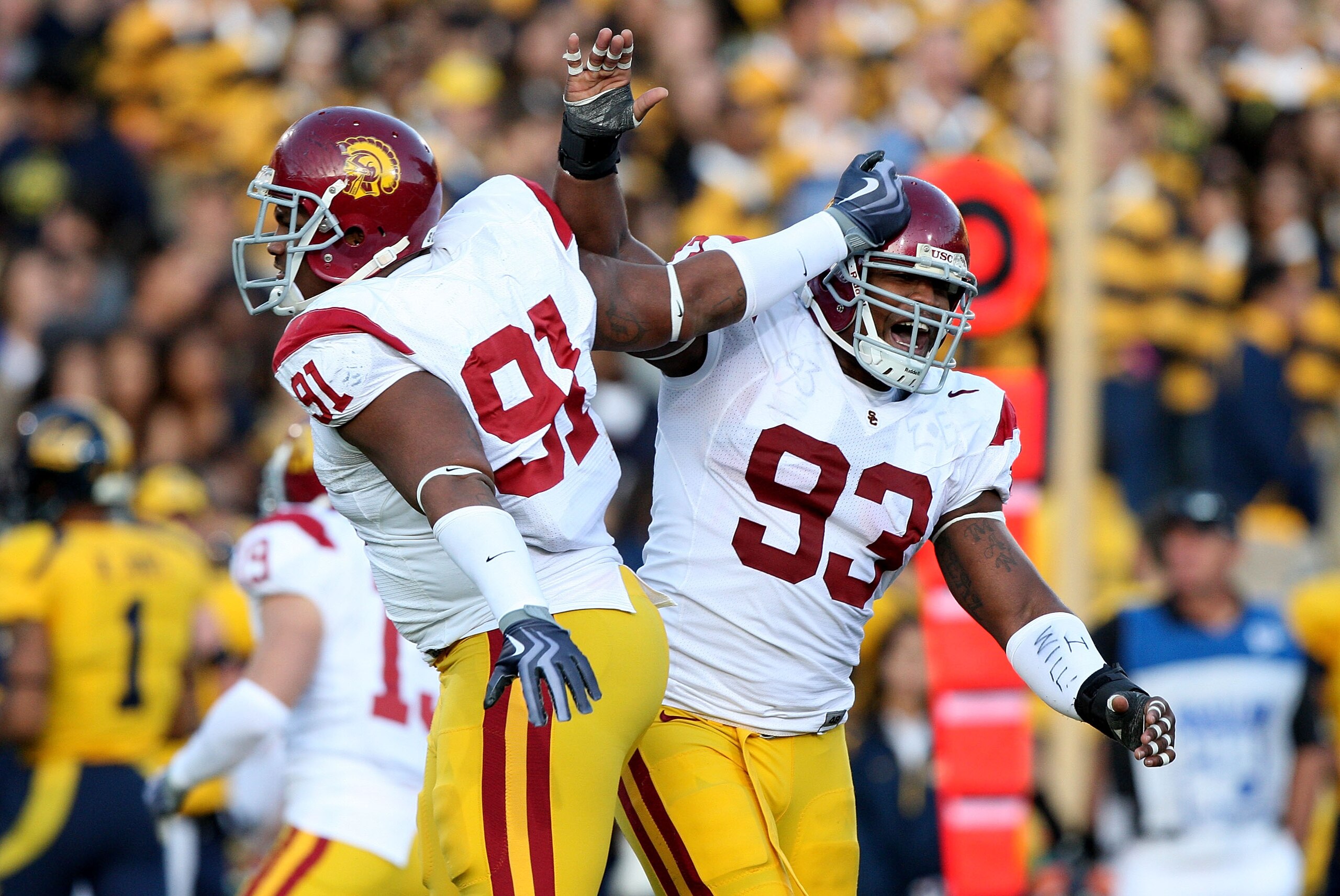 BERKELEY, CA - OCTOBER 3: Everson Griffen #93 of the USC Trojans celebratres with teammate Jurrell Casey #91 after a sack against the California Golden Bears at Memorial Stadium on October 3, 2009 in Berkeley, California.  (Photo by Jed Jacobsohn/Getty Im