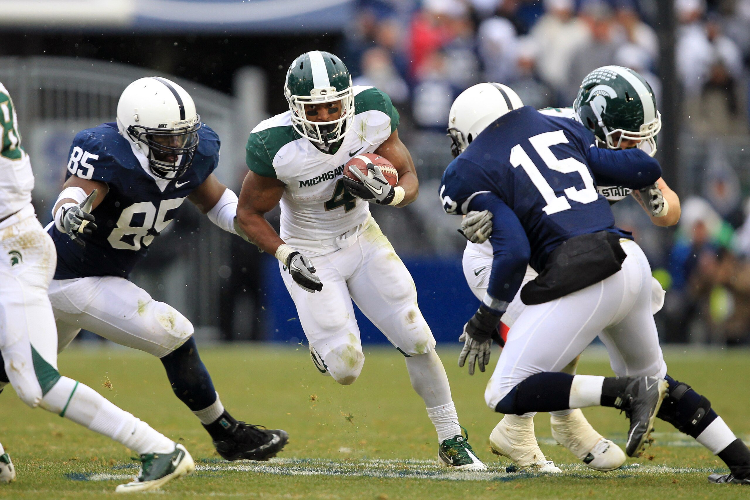 STATE COLLEGE, PA - NOVEMBER 27: Running back Edwin Baker #4 of the Michigan State Spartans carries the ball during a game against the Penn State Nittany Lions on November 27, 2010 at Beaver Stadium in State College, Pennsylvania. The Spartans won 28-22.(