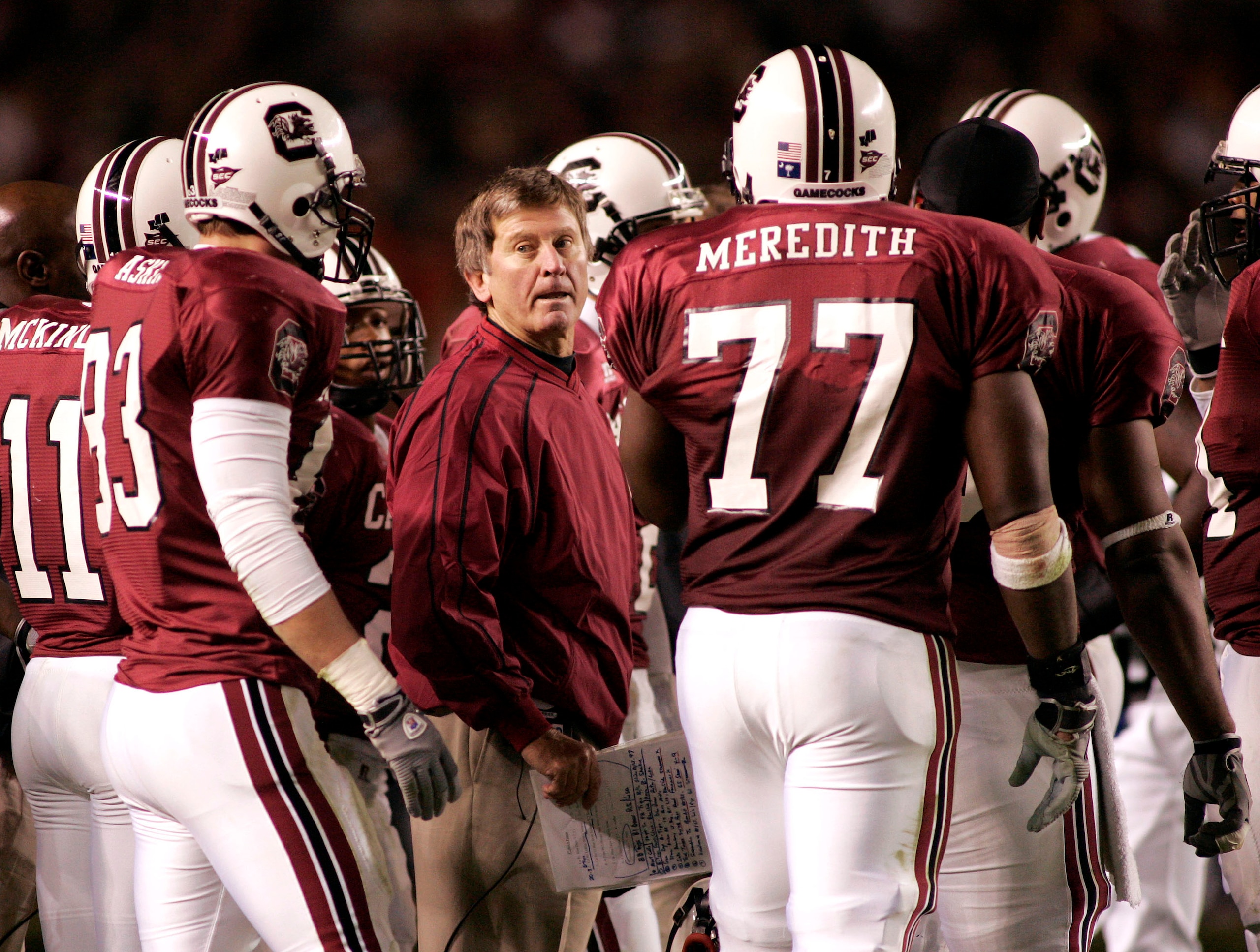 COLUMBIA, SC - NOVEMBER 19:  Coach Steve Spurrier of the South Carolina Gamecocks huddles with his team during a 13-9 loss to the Clemson Tigers on November 19, 2005, at Williams-Brice Stadium in Columbia, South Carolina.  (Photo By Grant Halverson/Getty