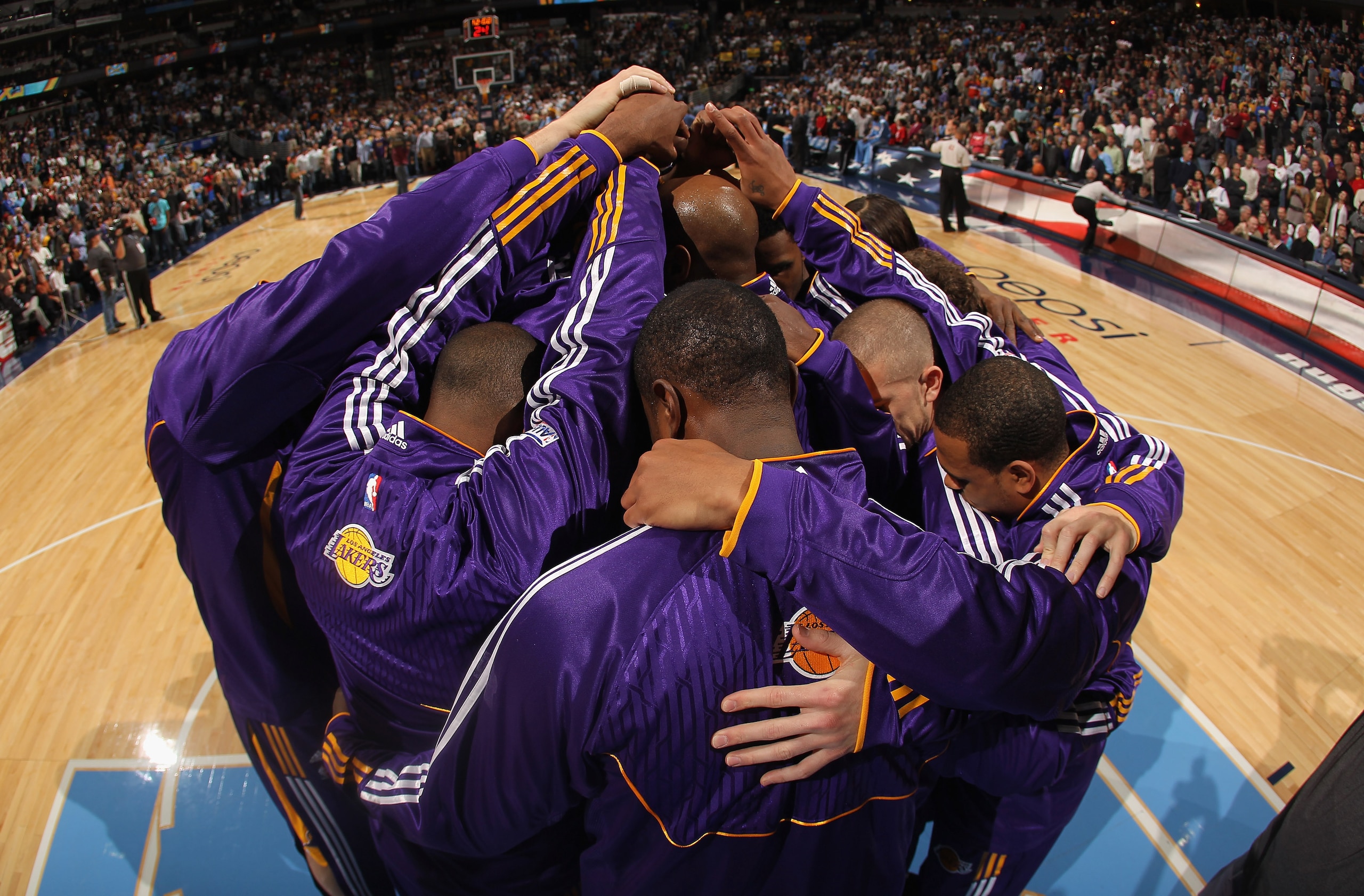 DENVER - NOVEMBER 11:  The Los Angeles Lakers huddle up as they prepare to face the Denver Nuggets at Pepsi Center on November 11, 2010 in Denver, Colorado. NOTE TO USER: User expressly acknowledges and agrees that, by downloading and/or using this Photog
