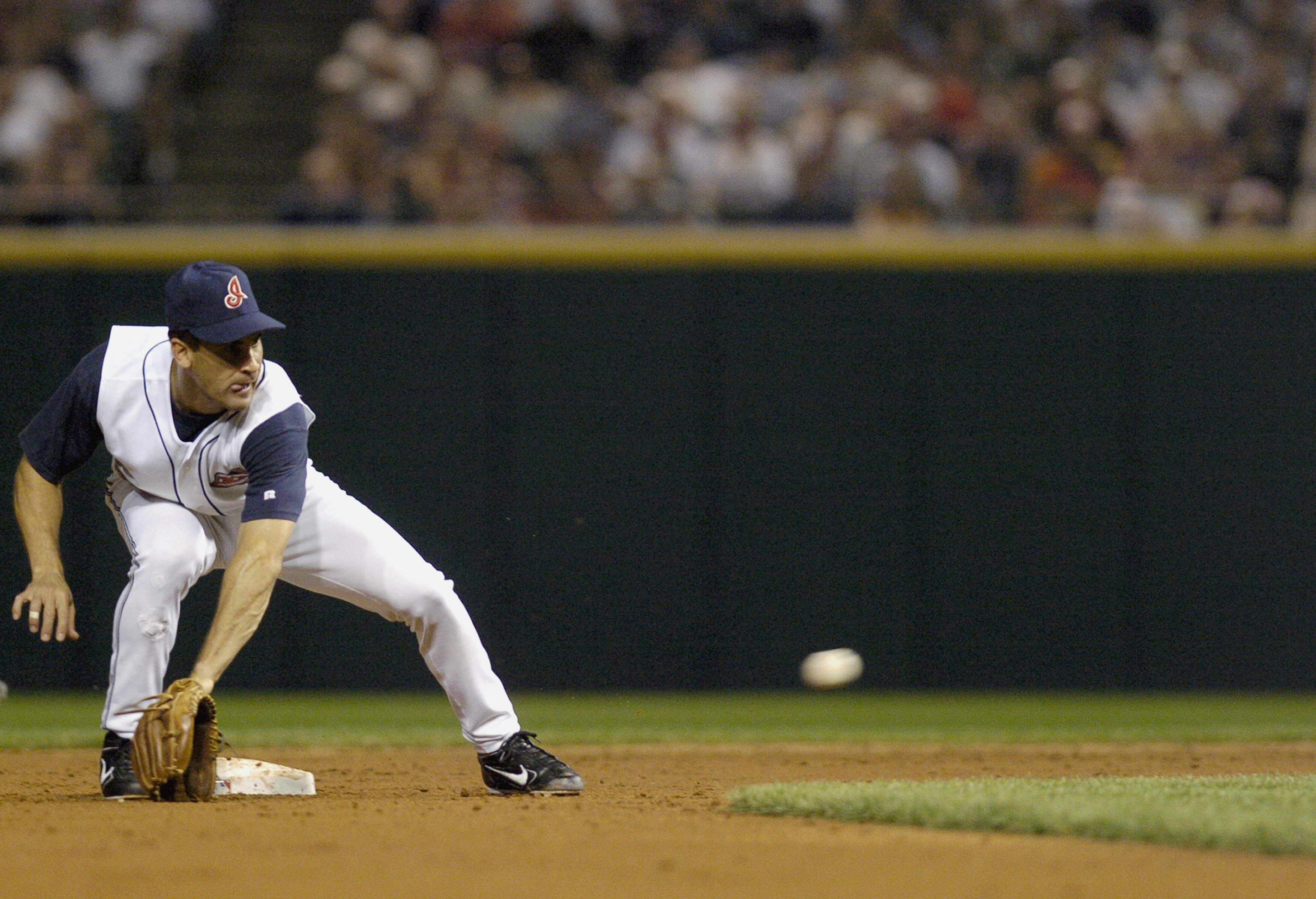 CLEVELAND, OH - SEPTEMBER 5:  Shortstop Omar Vizquel #13 of the Anaheim Angels fields the ball during the game against the Cleveland Indians on September 5, 2004 at Jacobs Field in Cleveland, Ohio. The Angels defeated the Indians 2-1.  (Photo by David Max