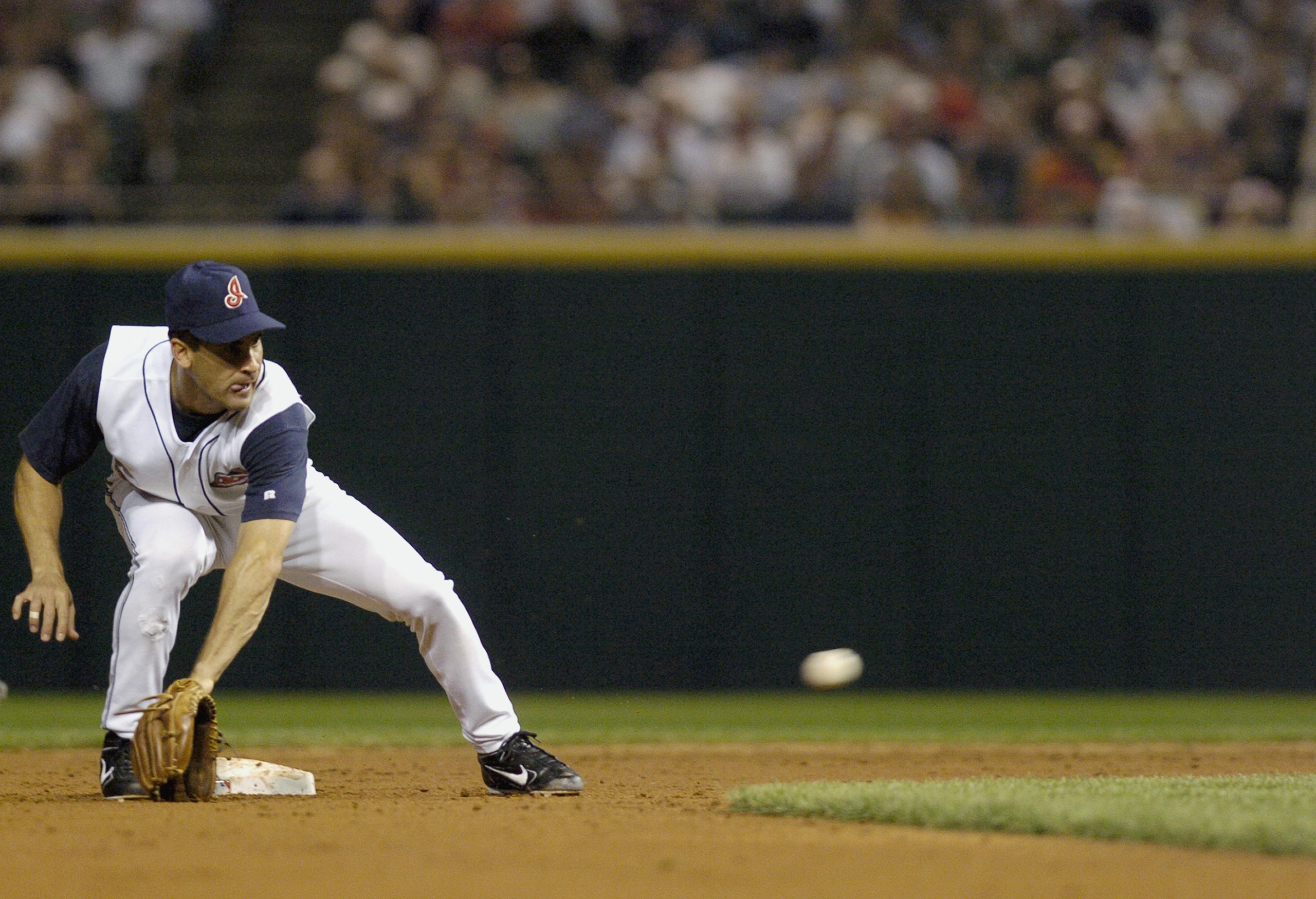 CLEVELAND, OH - SEPTEMBER 5:  Shortstop Omar Vizquel #13 of the Anaheim Angels fields the ball during the game against the Cleveland Indians on September 5, 2004 at Jacobs Field in Cleveland, Ohio. The Angels defeated the Indians 2-1.  (Photo by David Max