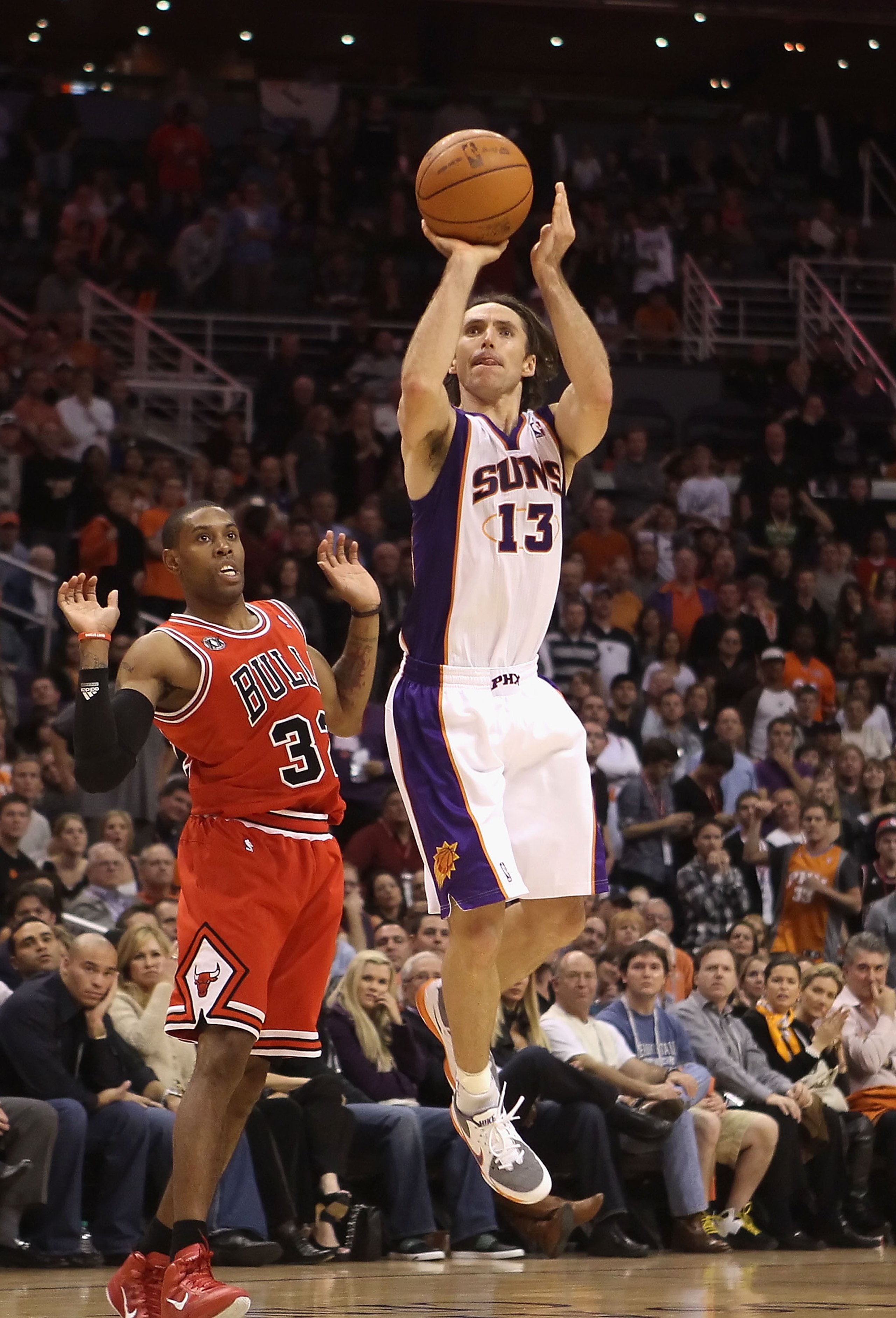PHOENIX - NOVEMBER 24:  Steve Nash #13 of the Phoenix Suns puts up a shot during the NBA game against the Chicago Bulls at US Airways Center on November 24, 2010 in Phoenix, Arizona. The Bulls defeated the Suns 123-115 in double overtime. NOTE TO USER: Us