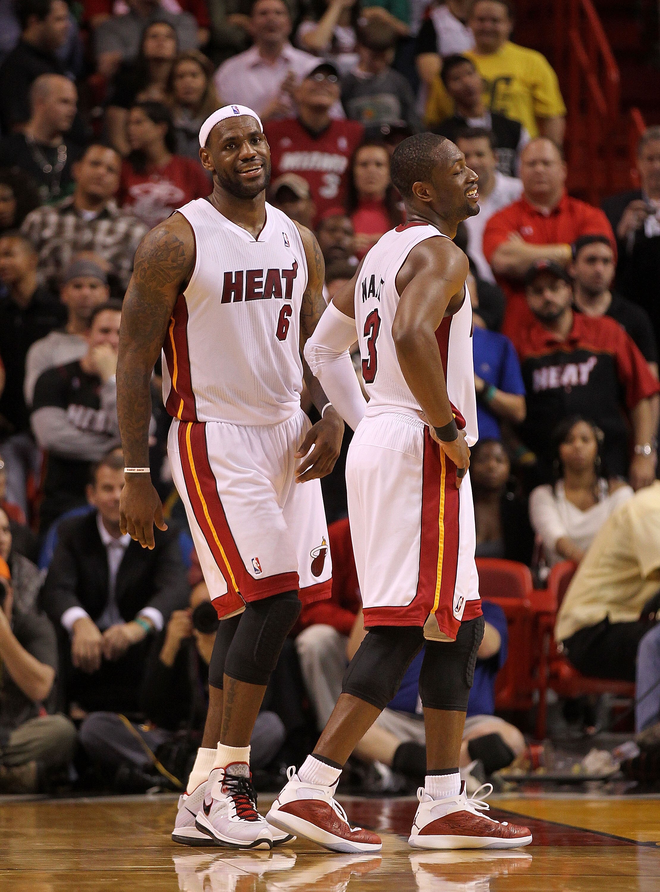 MIAMI, FL - FEBRUARY 08:  LeBron James #6 of the Miami Heat laughs with Dwyane Wade #3 during a game against the Indiana Pacers at American Airlines Arena on February 8, 2011 in Miami, Florida. NOTE TO USER: User expressly acknowledges and agrees that, by