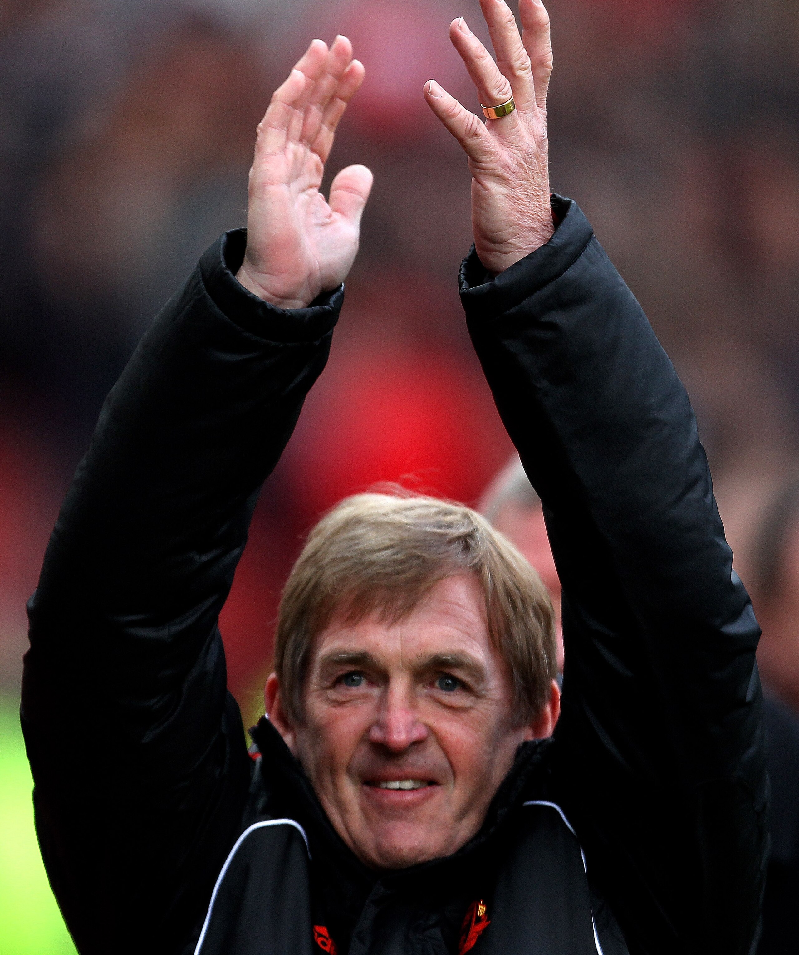 MANCHESTER, ENGLAND - JANUARY 09: Liverpool Manager Kenny Dalglish salutes the fans prior to the FA Cup sponsored by E.ON 3rd round match between Manchester United and Liverpool at Old Trafford on January 9, 2011 in Manchester, England. (Photo by Alex L MANCHESTER, ENGLAND - JANUARY 09: Liverpool Manager Kenny Dalglish salutes the fans prior to the FA Cup sponsored by E.ON 3rd round match between Manchester United and Liverpool at Old Trafford on January 9, 2011 in Manchester, England. (Photo by Alex L