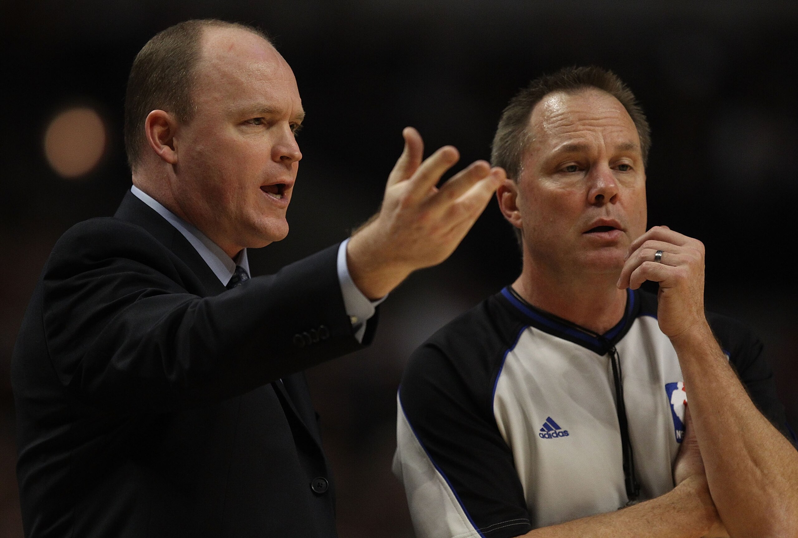 CHICAGO, IL - DECEMBER 28: Head coach Scott Skiles of the Milwaukee Bucks complains to referee Bill Spooner #22 during a game against the Chicago Bulls at the United Center on December 28, 2010 in Chicago, Illinois. NOTE TO USER: User expressly acknowledg