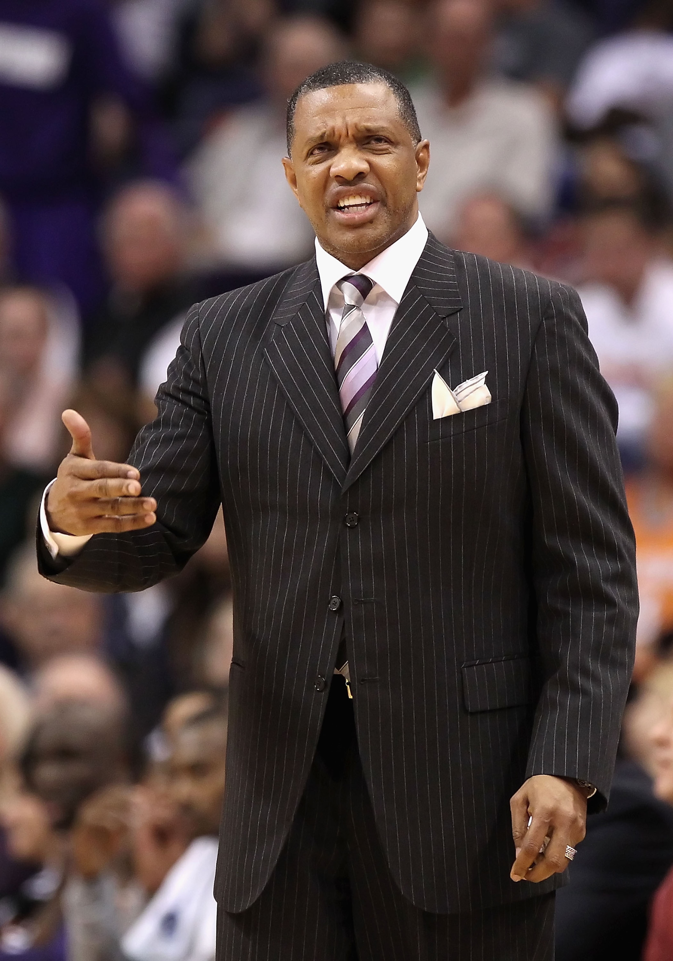 PHOENIX, AZ - JANUARY 30:   Head coach Alvin Gentry of the Phoenix Suns reacts during the NBA game against the New Orleans Hornets at US Airways Center on January 30, 2011 in Phoenix, Arizona.  The Suns defeated the Hornets 104-102.  NOTE TO USER: User ex
