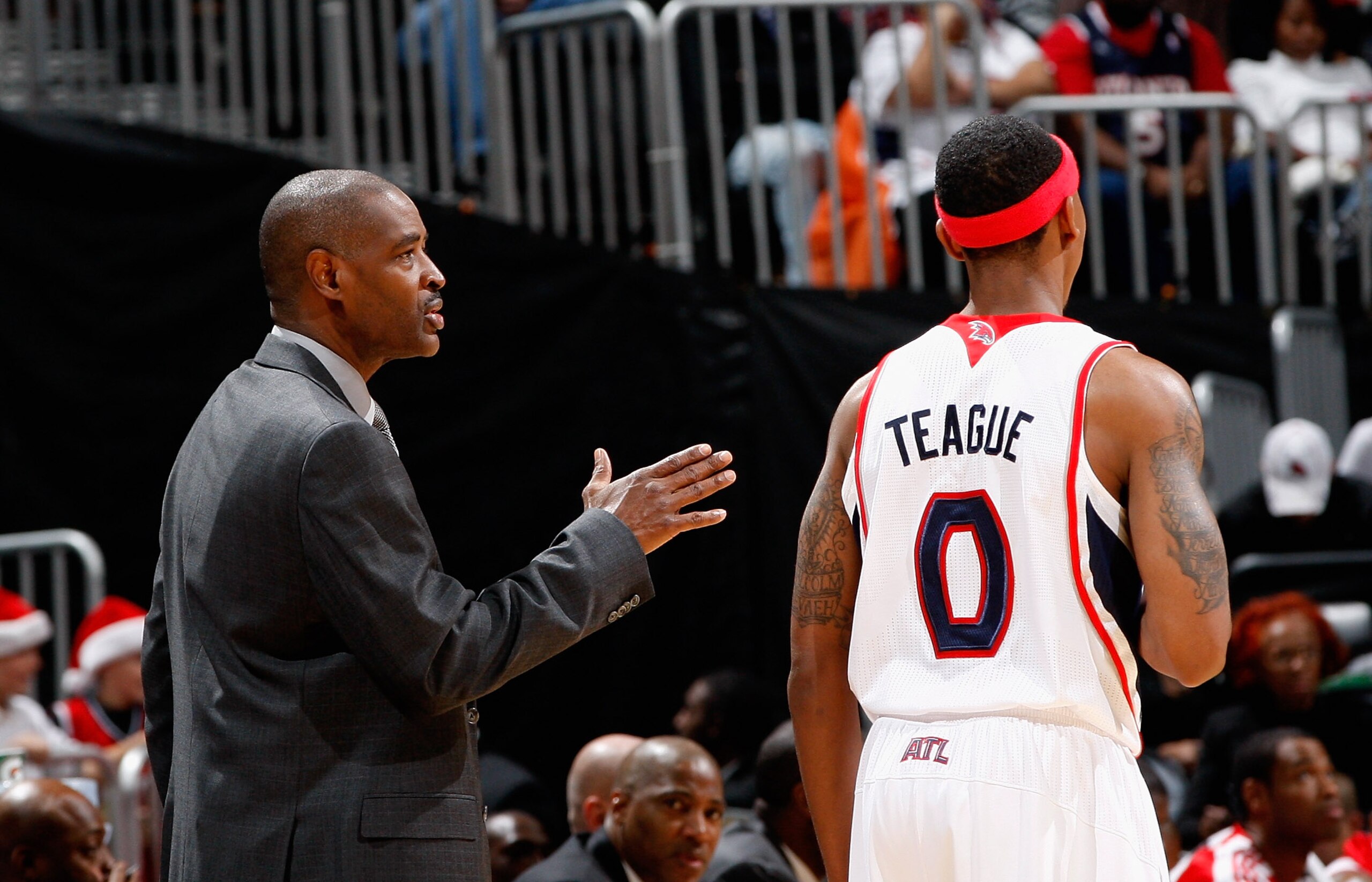 ATLANTA, GA - DECEMBER 11:  Head coach Larry Drew and Jeff Teague #0 of the Atlanta Hawks against the Indiana Pacers at Philips Arena on December 11, 2010 in Atlanta, Georgia.  NOTE TO USER: User expressly acknowledges and agrees that, by downloading and/