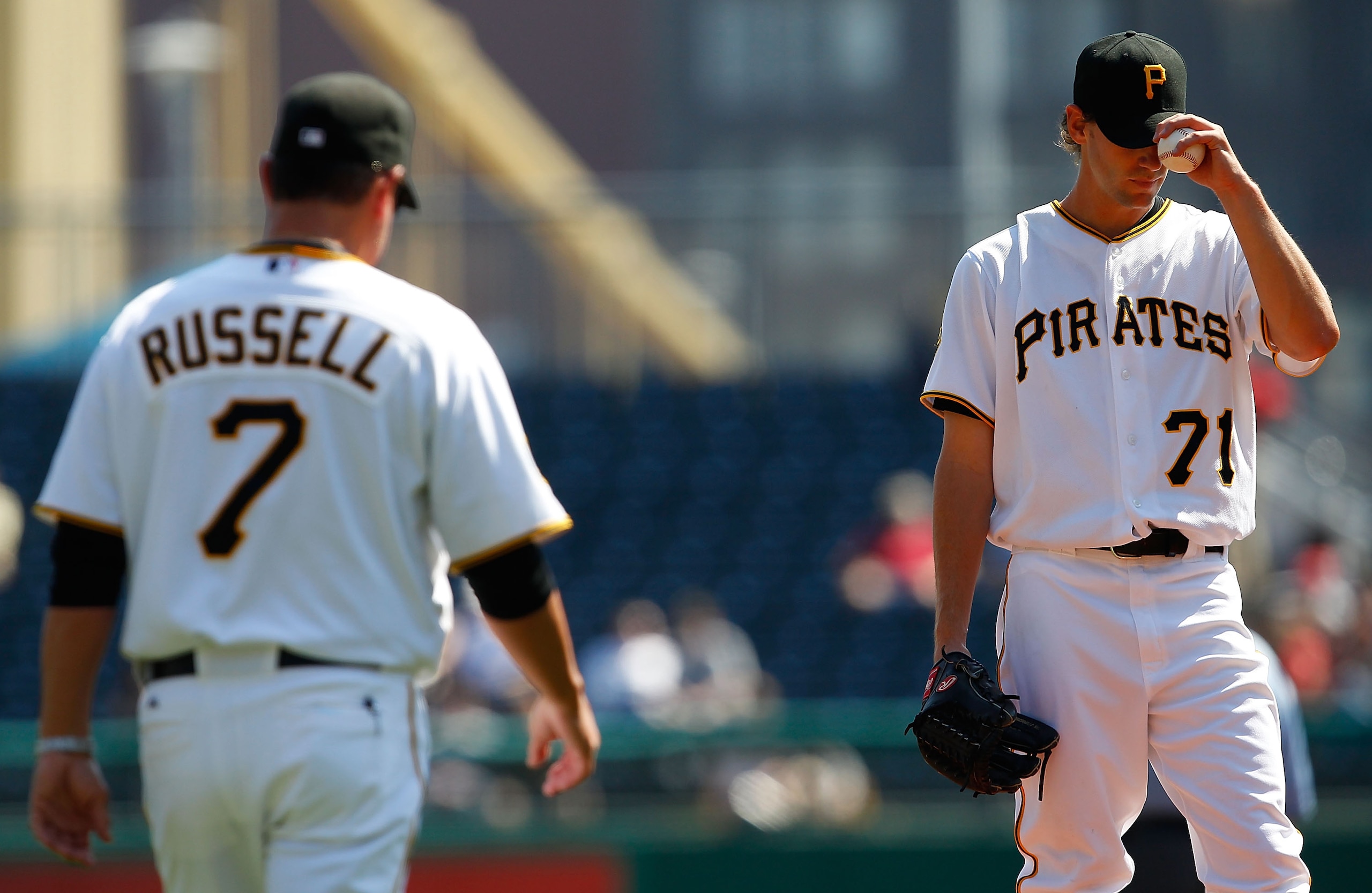 PITTSBURGH - SEPTEMBER 23:  Manager John Russell #7 of the Pittsburgh Pirates comes out to the mound to relieve Brian Burres #71 during the game against the St Louis Cardinals on September 23, 2010 at PNC Park in Pittsburgh, Pennsylvania.  (Photo by Jared