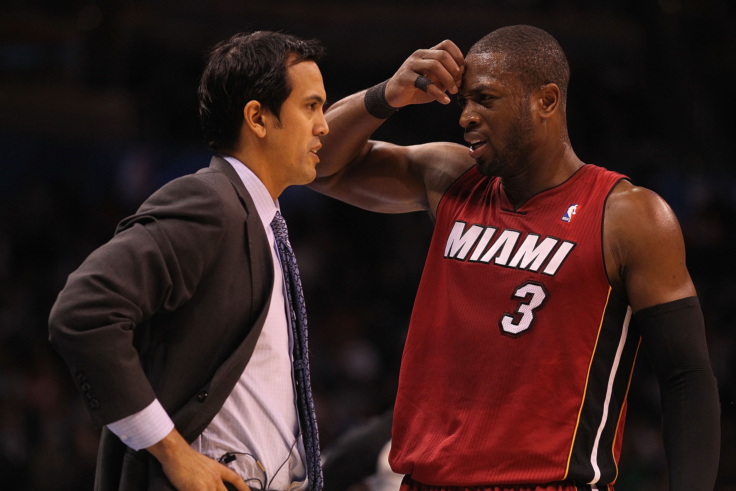 OKLAHOMA CITY, OK - JANUARY 30:  Head coach Erik Spoelstra and Dwyane Wade #3 of the Miami Heat during play against the Oklahoma City Thunder at Ford Center on January 30, 2011 in Oklahoma City, Oklahoma.  NOTE TO USER: User expressly acknowledges and agr