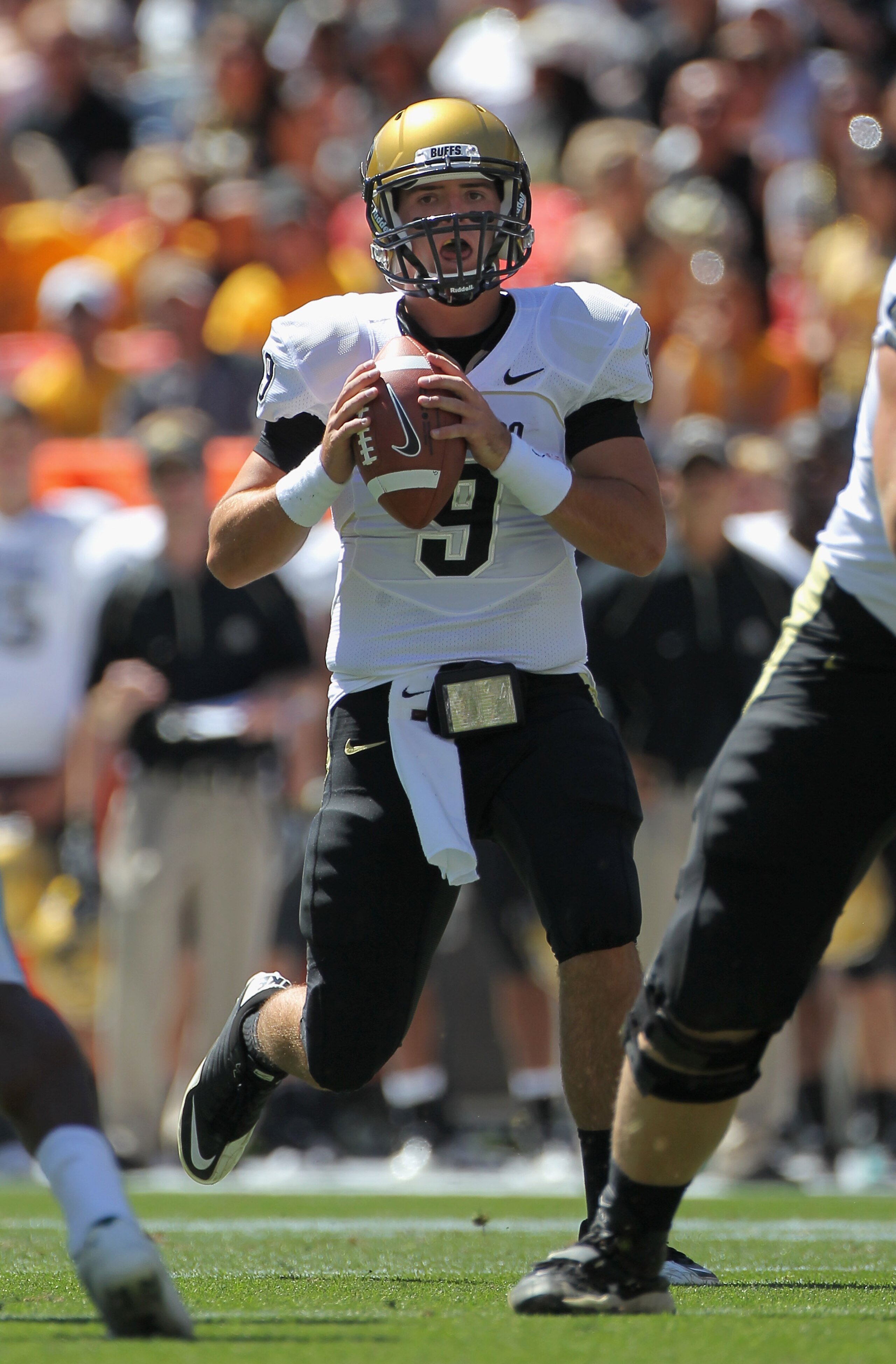 DENVER - SEPTEMBER 04: Quarterback Tyler Hansen #9 of the Colorado Buffaloes drops back to pass against the Colorado State Rams in the Rocky Mountain Showdown at INVESCO Field at Mile High on September 4, 2010 in Denver, Colorado. Colorado was awarded t DENVER - SEPTEMBER 04: Quarterback Tyler Hansen #9 of the Colorado Buffaloes drops back to pass against the Colorado State Rams in the Rocky Mountain Showdown at INVESCO Field at Mile High on September 4, 2010 in Denver, Colorado. Colorado was awarded t