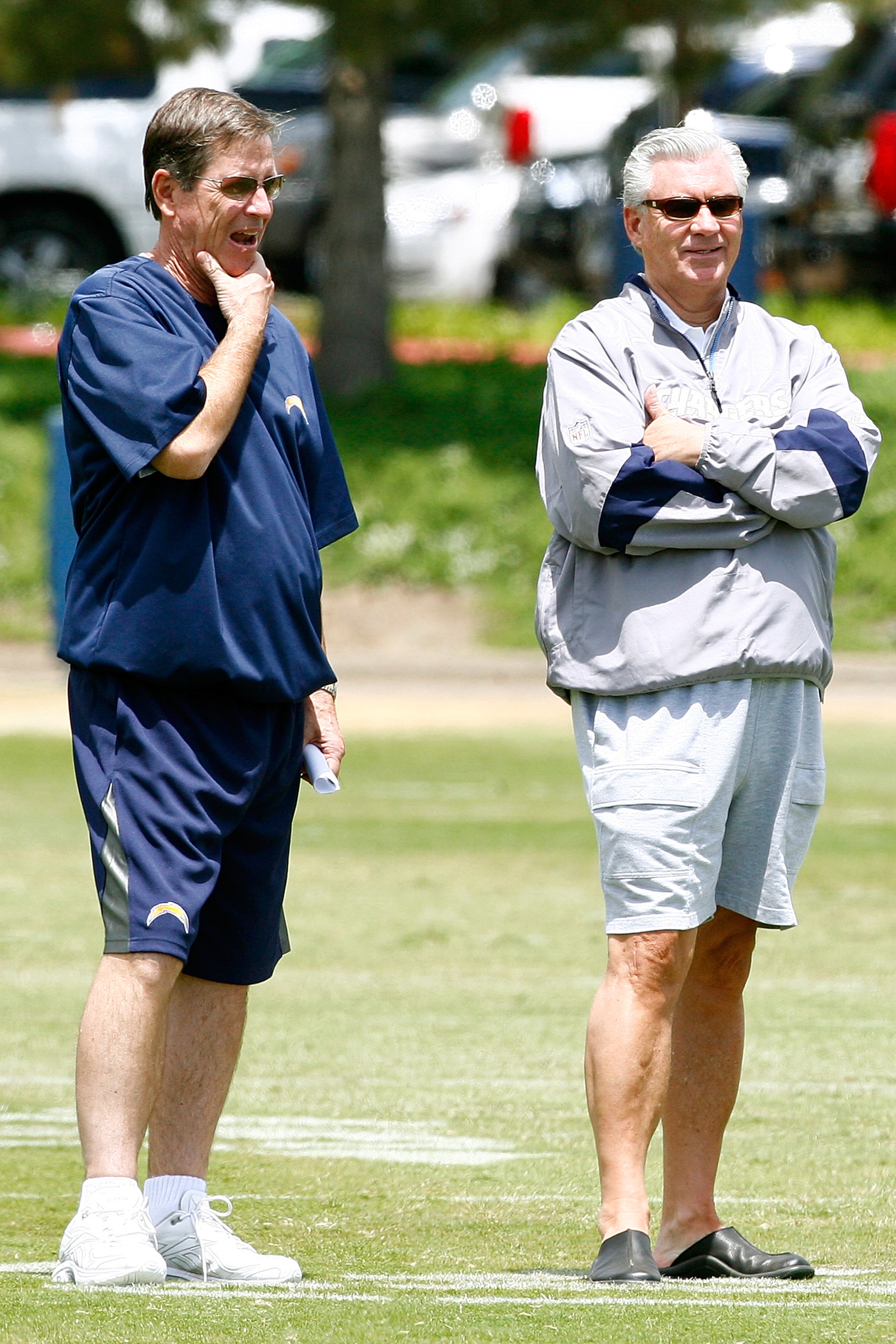 SAN DIEGO - MAY 03: Head coach Norv Turner and general manager A.J. Smith of the San Diego Chargers watch practice during minicamp at the Chargers training facility on May 3, 2009 in San Diego, California. (Photo by Kevin Terrell/Getty Images)