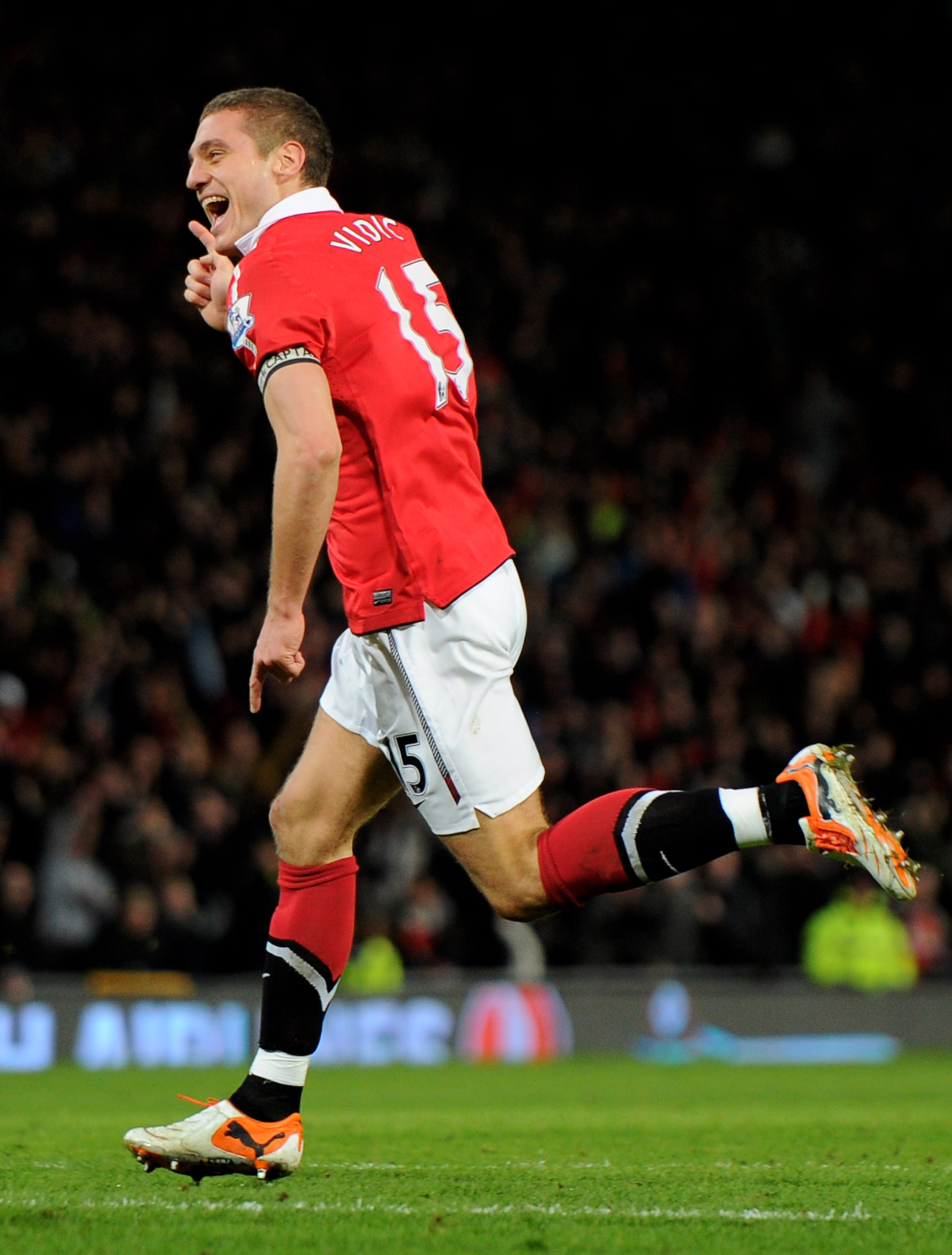 MANCHESTER, ENGLAND - FEBRUARY 01:  Nemanja Vidic of Manchester United celebrates scoring his team's third goal during the Barclays Premier League match between Manchester United and Aston Villa at Old Trafford on February 1, 2011 in Manchester, England.