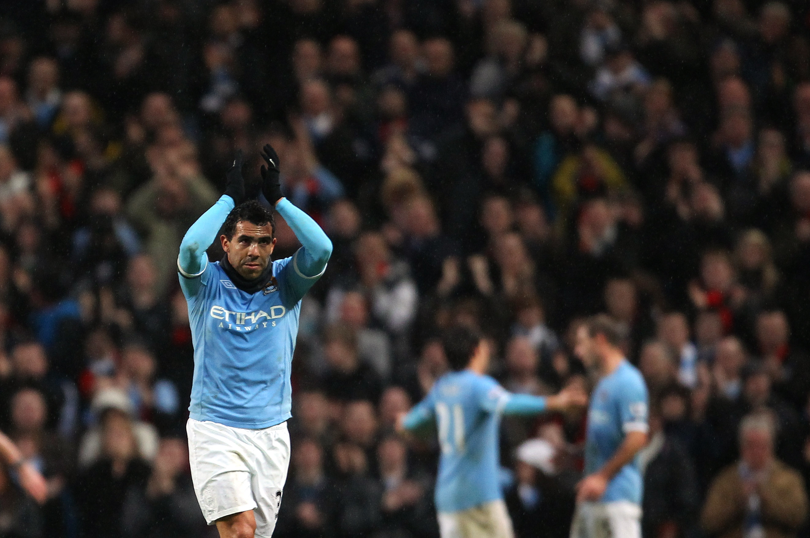 MANCHESTER, ENGLAND - FEBRUARY 05:  Carlos Tevez of Manchester City applauds his supporters after being substituted during the Barclays Premier League match between Manchester City and West Bromwich Albion at the City of Manchester Stadium on February 5,