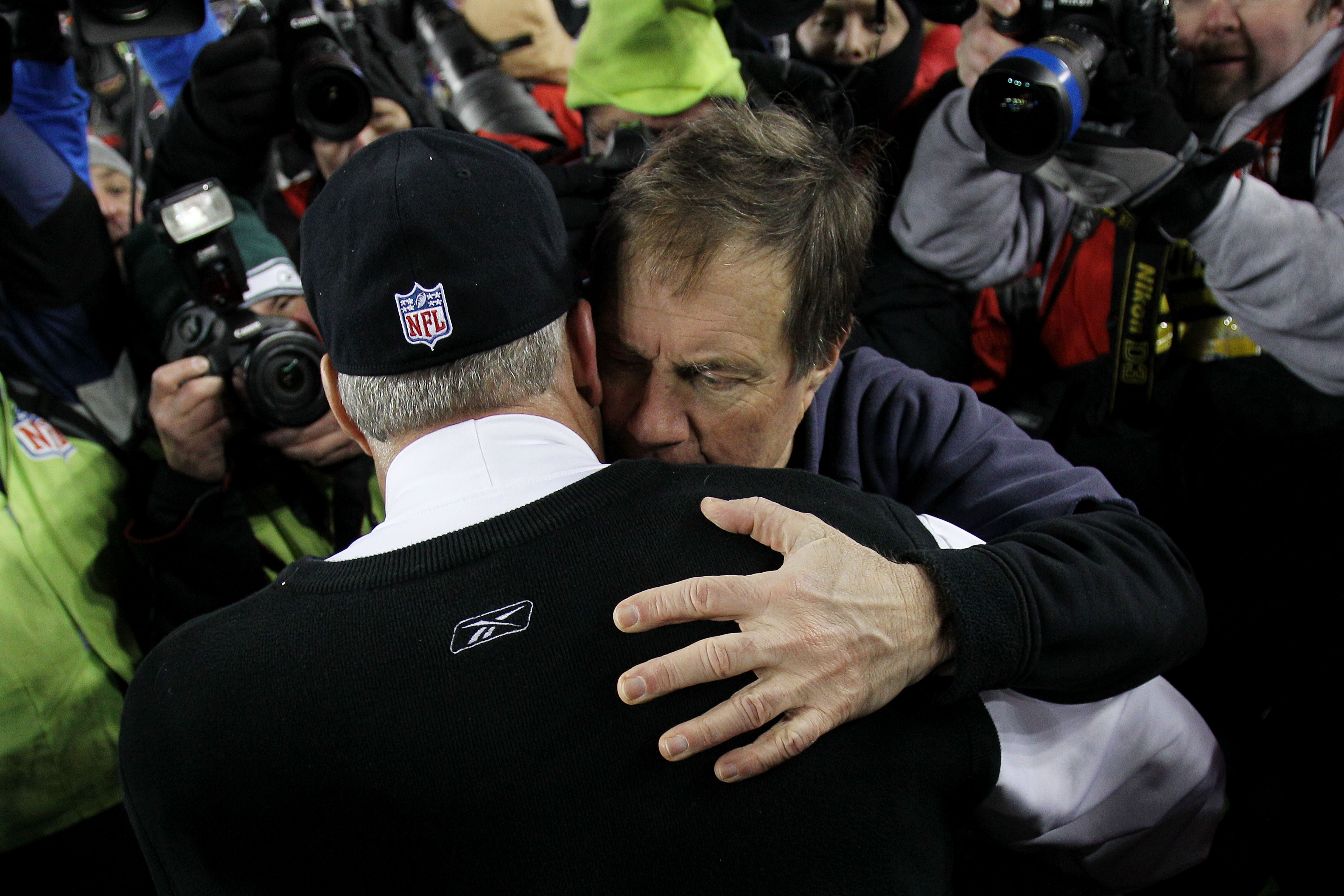 FOXBORO, MA - JANUARY 16:  Head coach Bill Belichick of the New England Patriots hugs head coach Rex Ryan of the New York Jets following their 2011 AFC divisional playoff game at Gillette Stadium on January 16, 2011 in Foxboro, Massachusetts.  (Photo by E