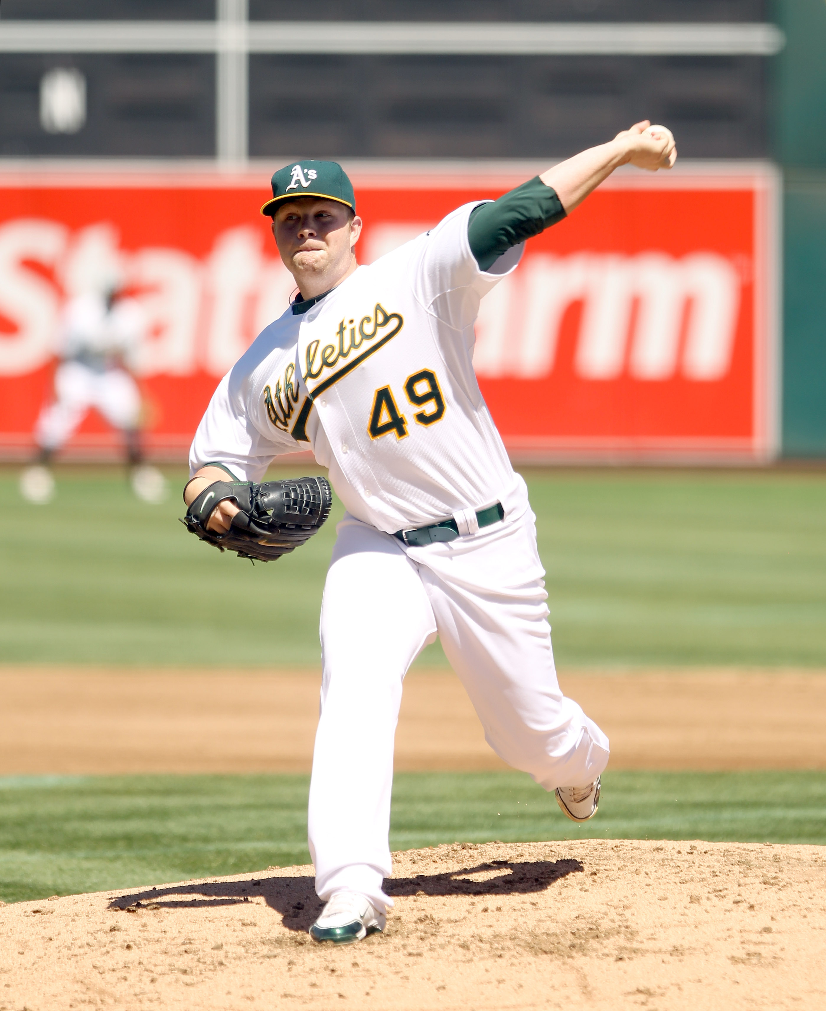 OAKLAND, CA - SEPTEMBER 06:  Brett Anderson #49 of the Oakland Athletics pitches against the Seattle Mariners at the Oakland-Alameda County Coliseum on September 6, 2010 in Oakland, California.  (Photo by Ezra Shaw/Getty Images)