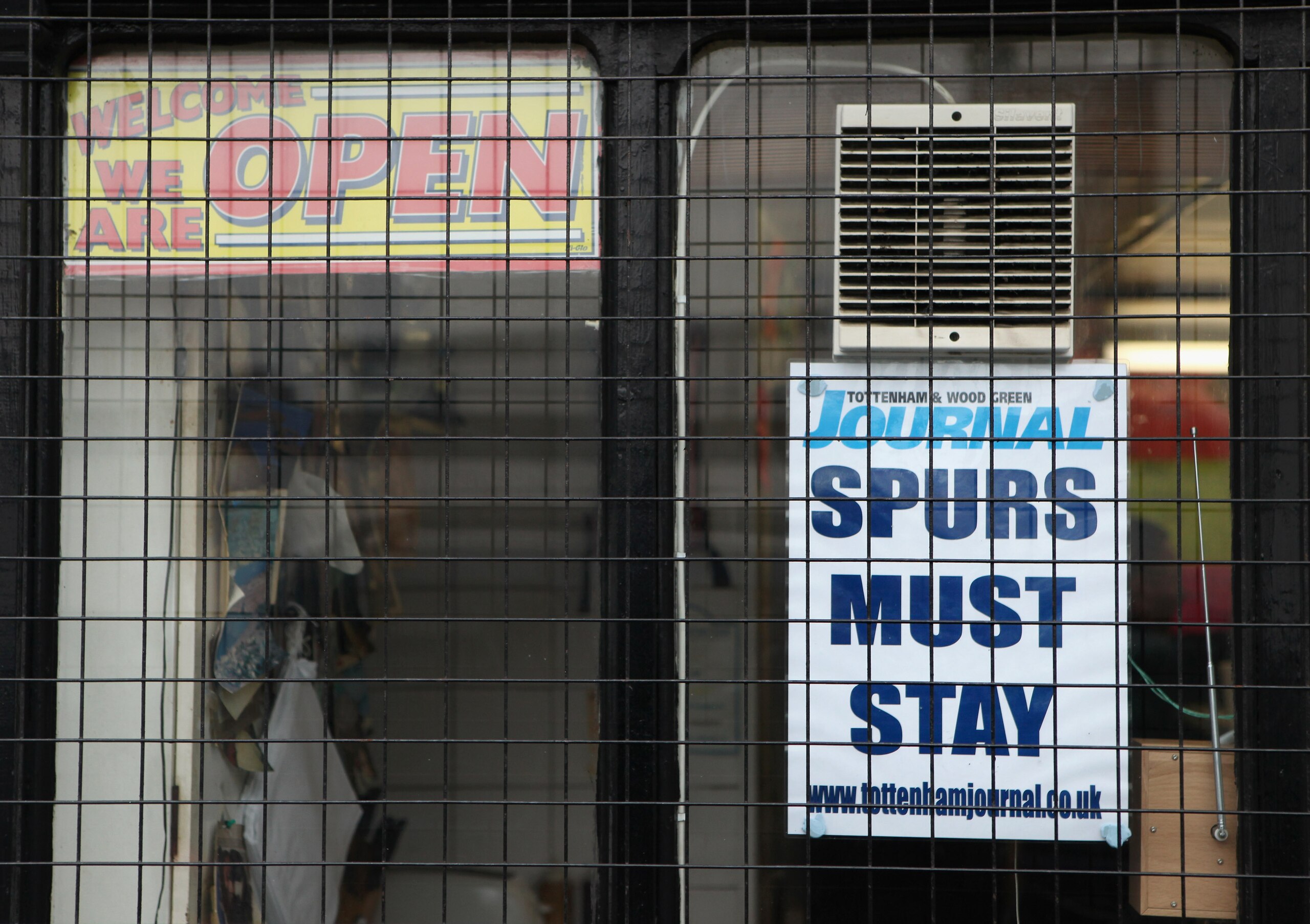 LONDON, ENGLAND - JANUARY 24:  A poster appealing for Tottenham Hotspur not to relocate to Stratford is placed in the window of a cafe adjacent to the club's White Hart Lane stadium in north London on January 24, 2011 in London, England. Tottenham and Wes