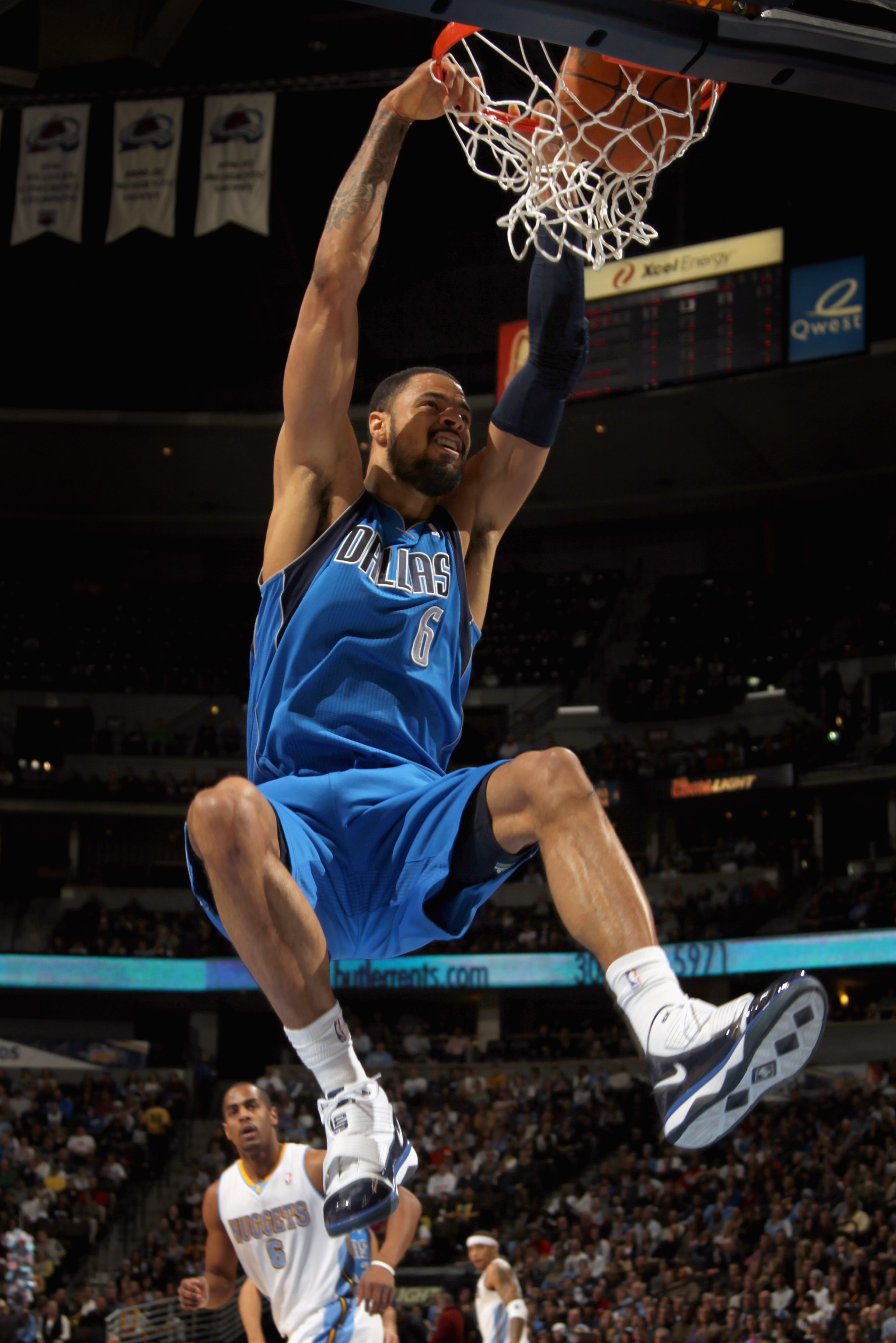 DENVER, CO - FEBRUARY 10:  Tyson Chandler #6 of the Dallas Mavericks dunks the ball against the Denver Nuggets during NBA action at the Pepsi Center on February 10, 2011 in Denver, Colorado. NOTE TO USER: User expressly acknowledges and agrees that, by do