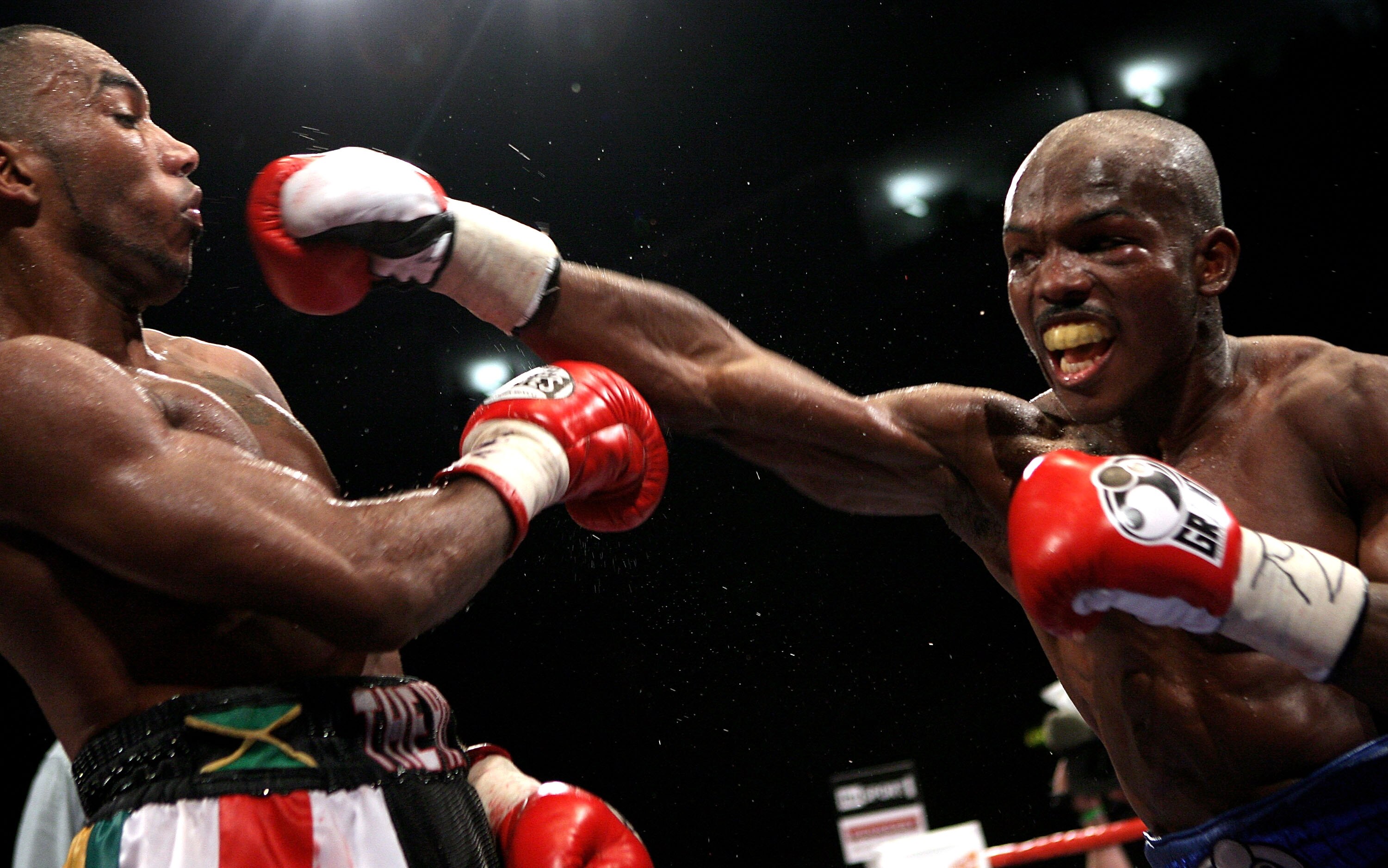 NOTTINGHAM, ENGLAND - MAY 10:  Timothy Bradley (R) throws a straight right against Junior Witter during their WBC Light Welterweight fight on May 10, 2008 at Nottingham Ice Arena in Nottingham, England. (Photo by John Gichigi/Getty Images)