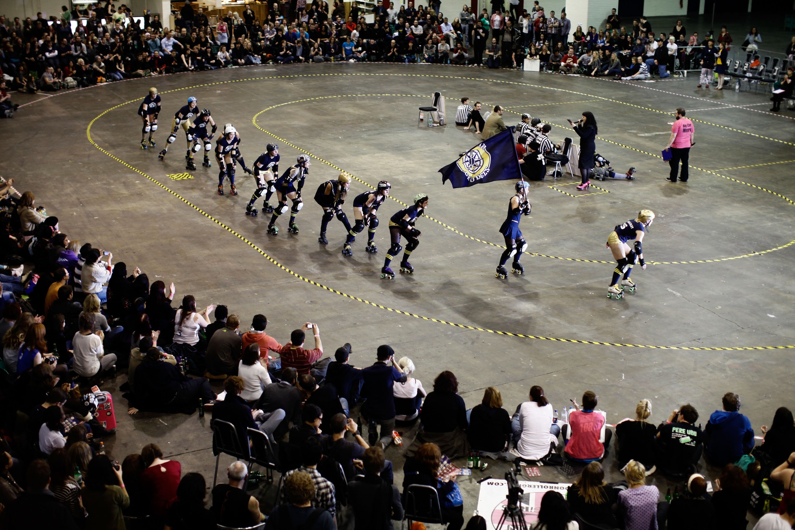 LONDON, ENGLAND - NOVEMBER 13: General view of the London Rollergirls Roller Derby event at London Earls Court Olympia on November 13, 2010 in London, England. The contact sport of Roller Derby involves two teams of four defensive players and one jammer, LONDON, ENGLAND - NOVEMBER 13: General view of the London Rollergirls Roller Derby event at London Earls Court Olympia on November 13, 2010 in London, England. The contact sport of Roller Derby involves two teams of four defensive players and one jammer,