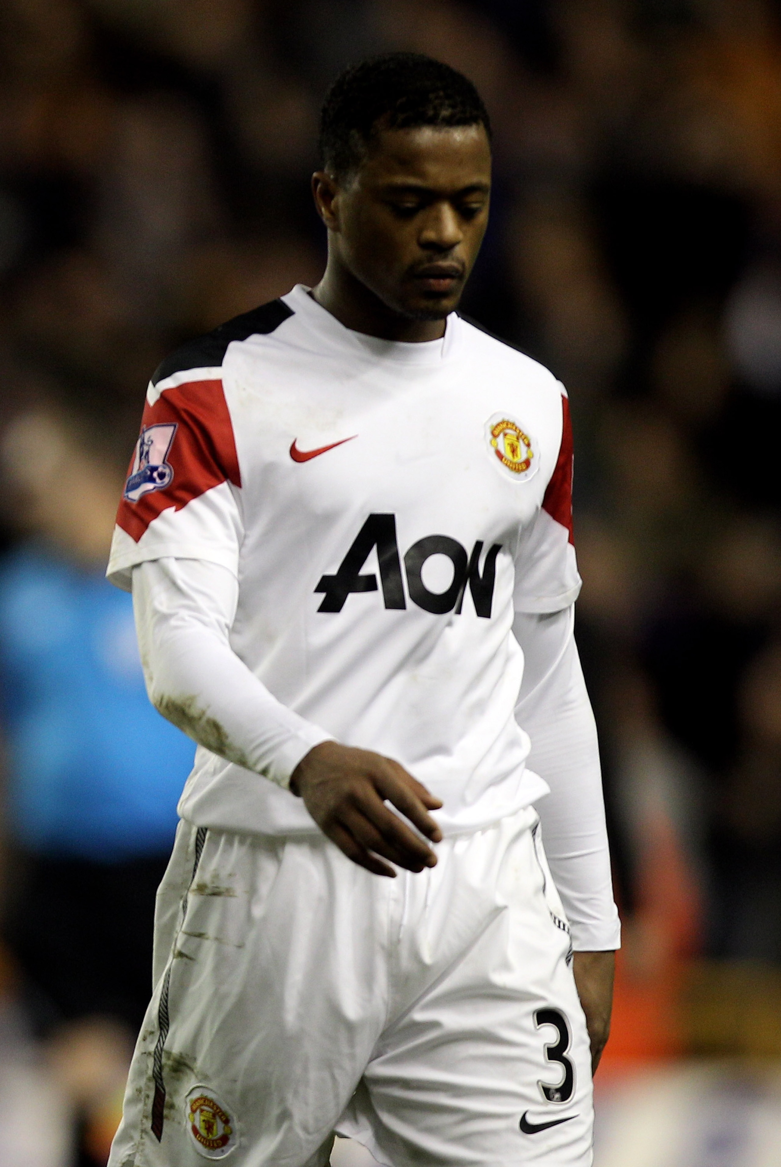 WOLVERHAMPTON, ENGLAND - FEBRUARY 05: Patrice Evra leaves the pitch dejected after the Barclays Premier League match between Wolverhampton Wanderers and Manchester United at Molineux on February 5, 2011 in Wolverhampton, England. (Photo by Michael Steel WOLVERHAMPTON, ENGLAND - FEBRUARY 05: Patrice Evra leaves the pitch dejected after the Barclays Premier League match between Wolverhampton Wanderers and Manchester United at Molineux on February 5, 2011 in Wolverhampton, England. (Photo by Michael Steel