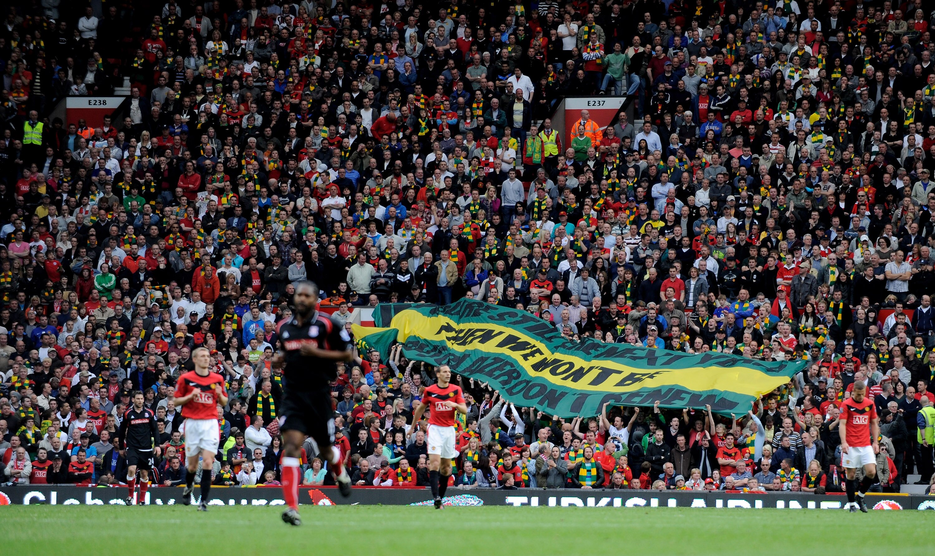 MANCHESTER, ENGLAND - MAY 09:  Manchester United fans show off banners protesting against the club's owners during the Barclays Premier League match between Manchester United and Stoke City at Old Trafford on May 9, 2010 in Manchester, England.  (Photo by