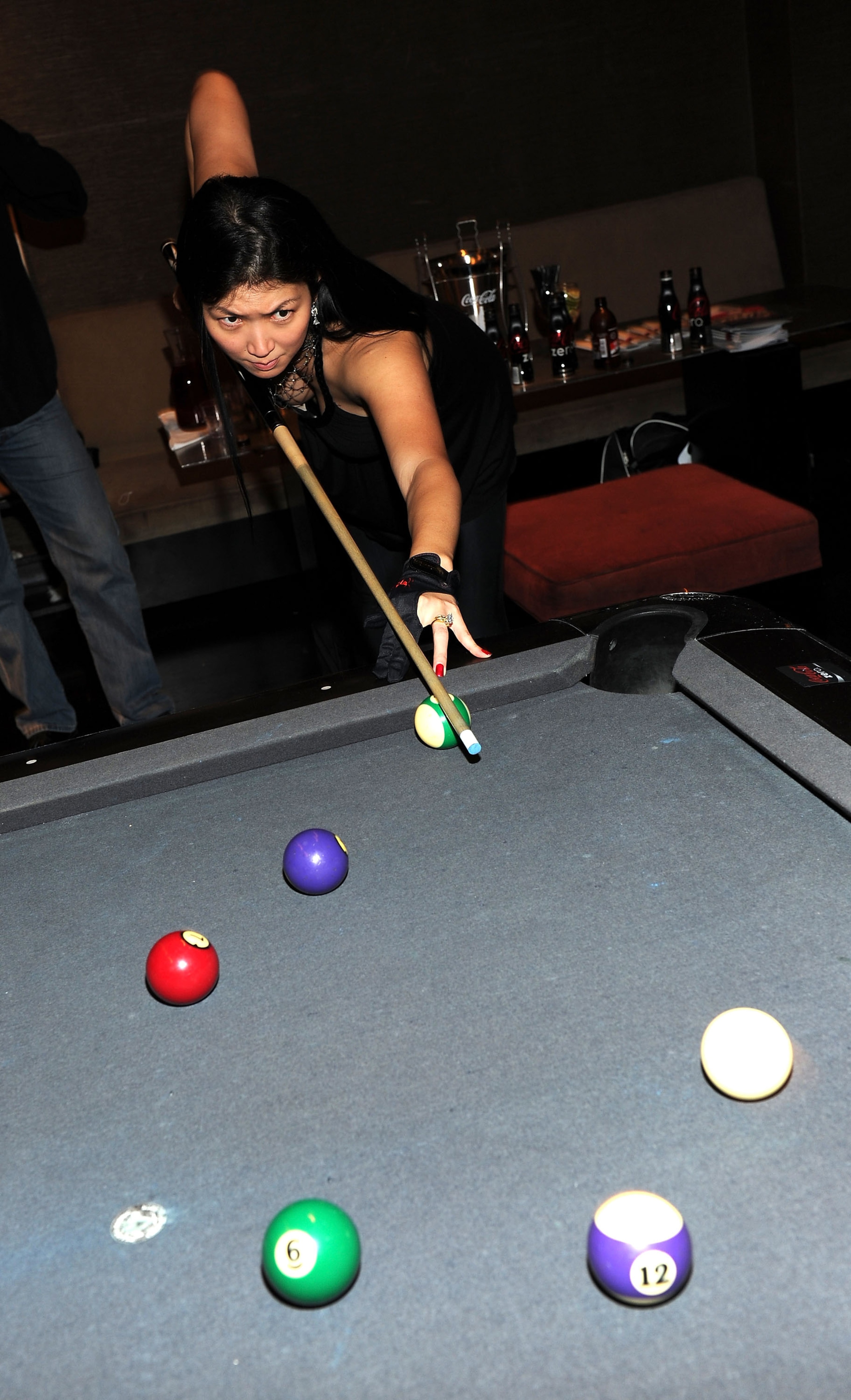 NEW YORK - JUNE 03: Pool player Jeanette Lee lines up a shot during NY Giant Justin Tuck's Celebrity Billiards Tournament at Slate on June 3, 2010 in New York City. (Photo by Jason Kempin/Getty Images for All Stars Helping Kids) NEW YORK - JUNE 03: Pool player Jeanette Lee lines up a shot during NY Giant Justin Tuck's Celebrity Billiards Tournament at Slate on June 3, 2010 in New York City. (Photo by Jason Kempin/Getty Images for All Stars Helping Kids)