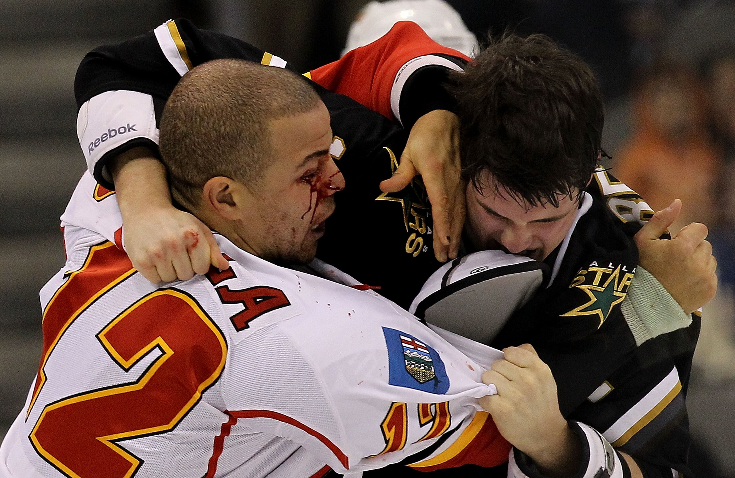 DALLAS, TX - DECEMBER 23: Right wing Jarome Iginla #12 of the Calgary Flames fights with Jamie Benn #14 of the Dallas Stars at American Airlines Center on December 23, 2010 in Dallas, Texas. (Photo by Ronald Martinez/Getty Images) DALLAS, TX - DECEMBER 23: Right wing Jarome Iginla #12 of the Calgary Flames fights with Jamie Benn #14 of the Dallas Stars at American Airlines Center on December 23, 2010 in Dallas, Texas. (Photo by Ronald Martinez/Getty Images)