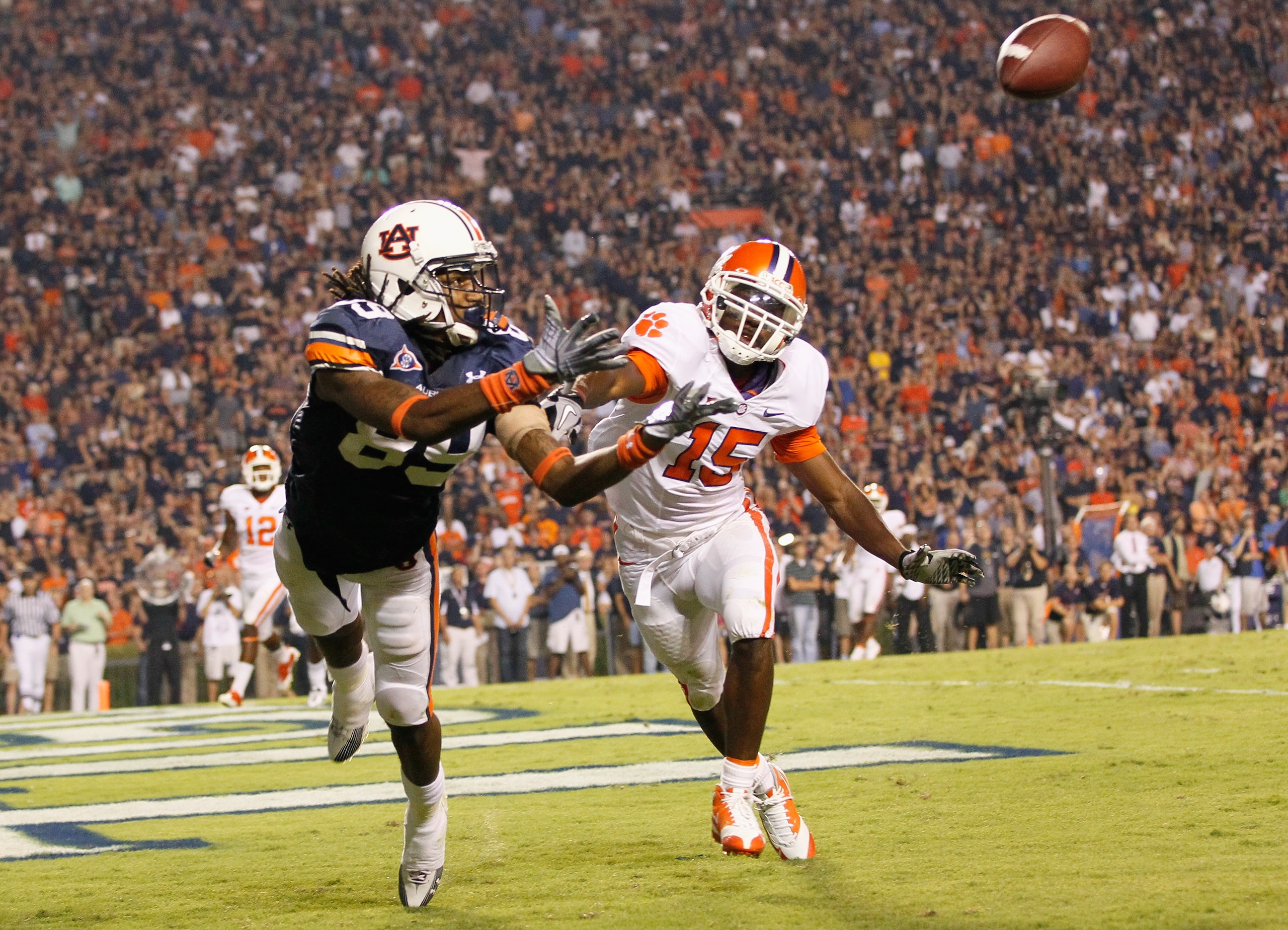 AUBURN, AL - SEPTEMBER 18: Darvin Adams #89 of the Auburn Tigers fails to pull in this touchdown reception in overtime against Coty Sensabaugh #15 of the Clemson Tigers at Jordan-Hare Stadium on September 18, 2010 in Auburn, Alabama. (Photo by Kevin C. AUBURN, AL - SEPTEMBER 18: Darvin Adams #89 of the Auburn Tigers fails to pull in this touchdown reception in overtime against Coty Sensabaugh #15 of the Clemson Tigers at Jordan-Hare Stadium on September 18, 2010 in Auburn, Alabama. (Photo by Kevin C.