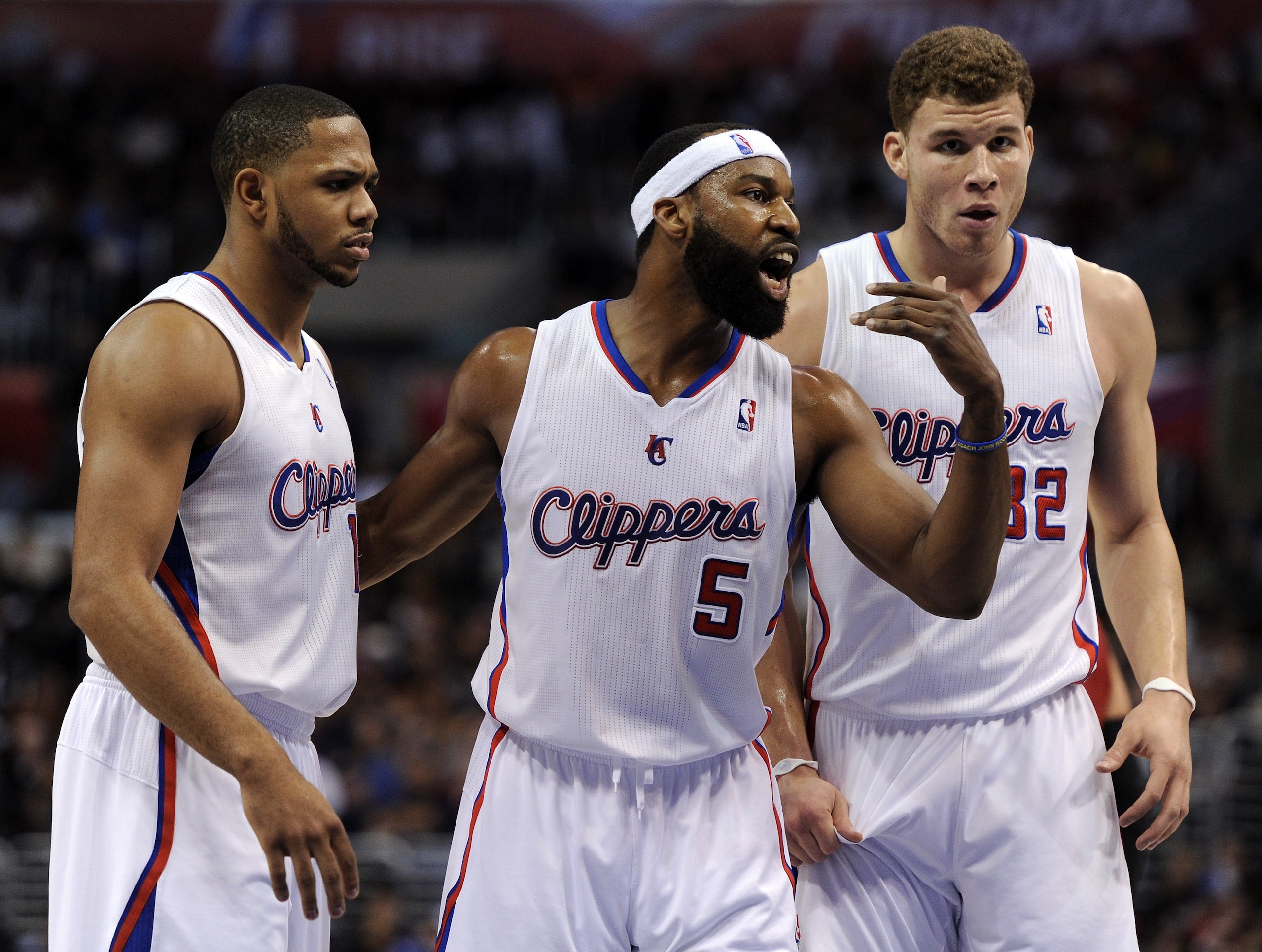 LOS ANGELES, CA - JANUARY 12:  Baron Davis #5 of the Los Angeles Clippers gathers Blake Griffin #32 and Eric Gordon #10 for a chat during the game against the Miami Heat at Staples Center on January 12, 2011 in Los Angeles, California.  NOTE TO USER: User